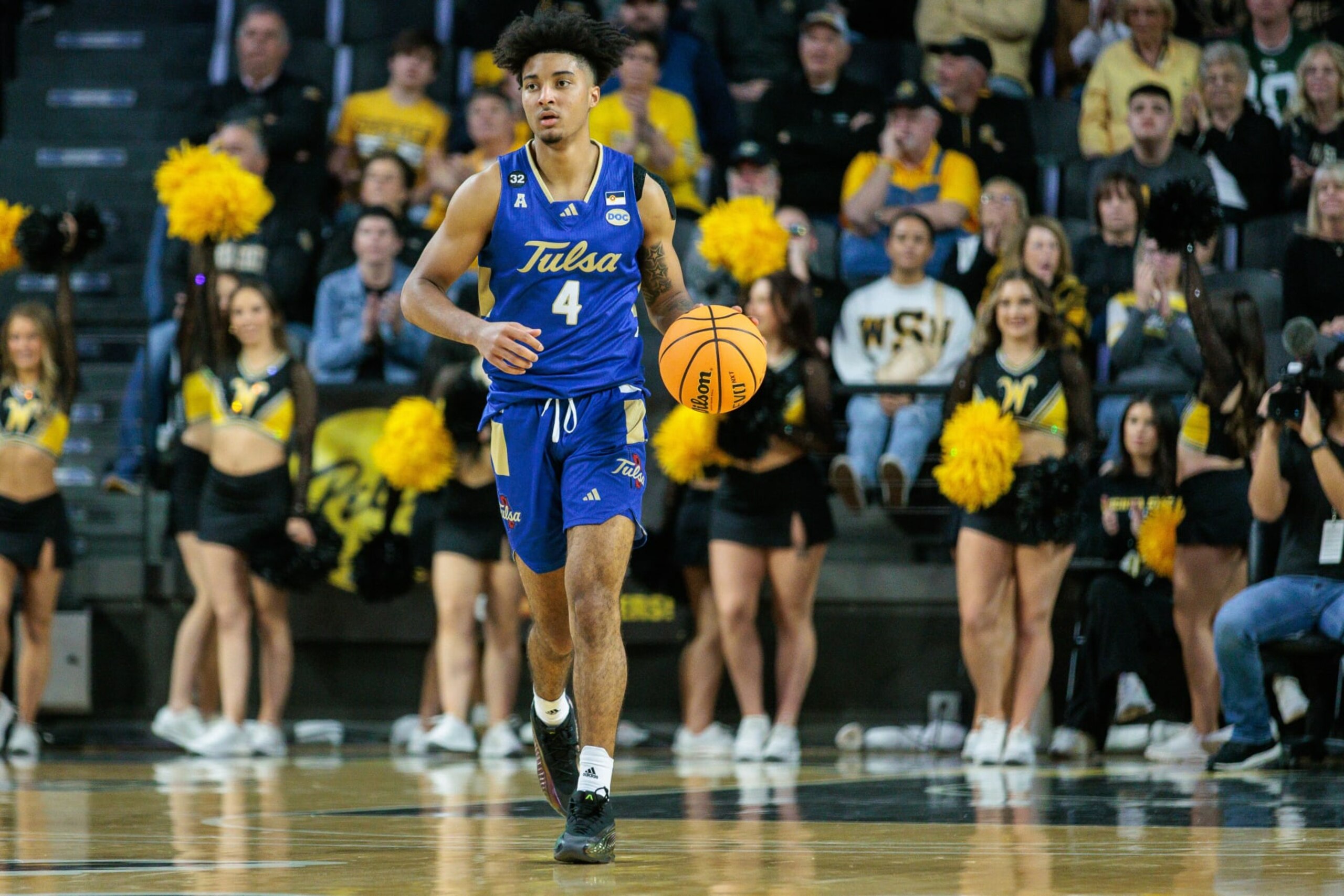WICHITA, KS - FEBRUARY 21: Tulsa Golden Hurricane guard PJ Haggerty (4) brings the ball up court against the Wichita State Shockers on February 21st, 2024 at Charles Koch Arena in Wichita, Ks. (Photo by WJ/Icon Sportswire via Getty Images)