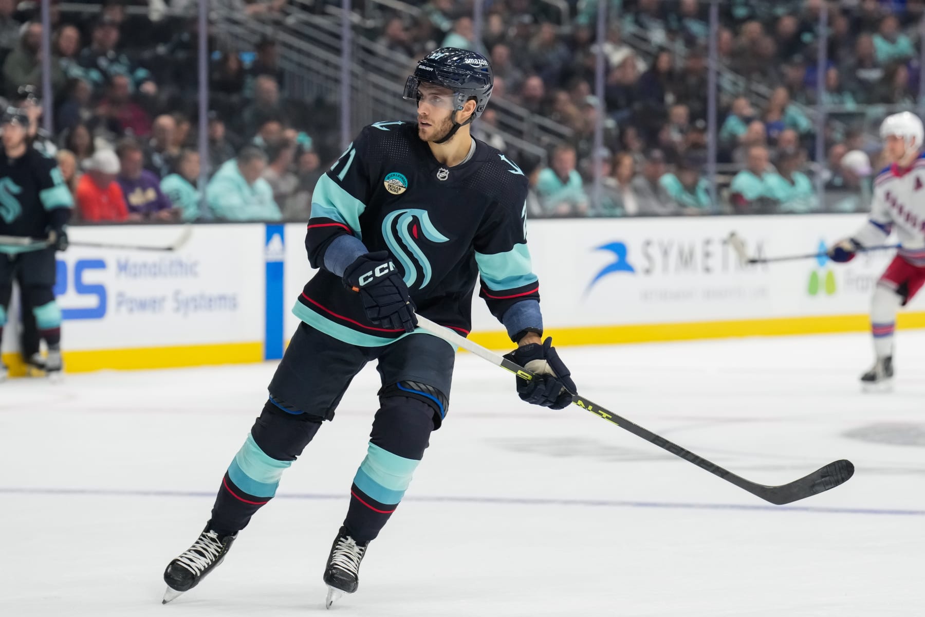 SEATTLE, WASHINGTON - OCTOBER 21: Alex Wennberg #21 of the Seattle Kraken skates during the first period of a game against the New York Rangers at Climate Pledge Arena on October 21, 2023 in Seattle, Washington. (Photo by Christopher Mast/NHLI via Getty Images)