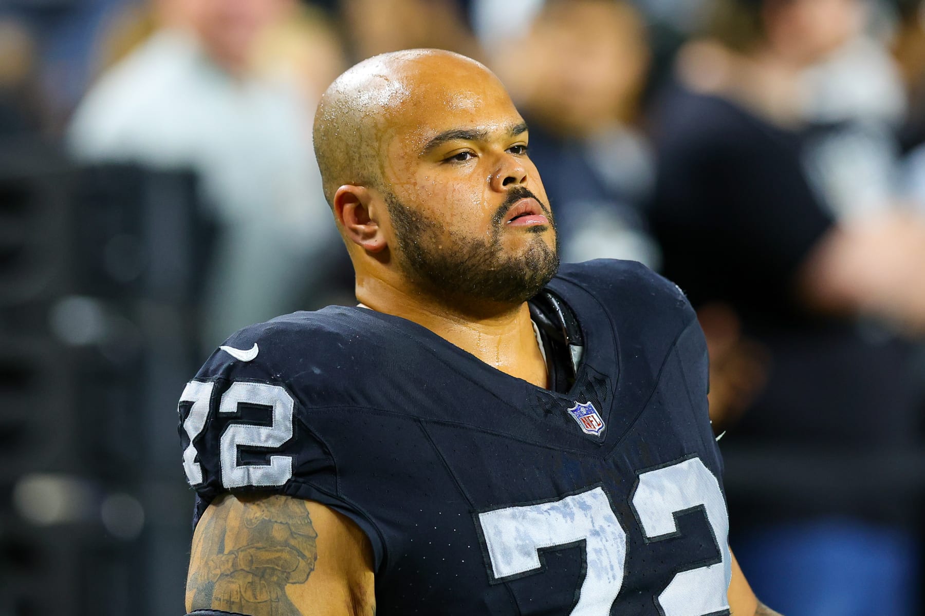 LAS VEGAS, NV - DECEMBER 14: Las Vegas Raiders guard Jermaine Eluemunor (72) warms up before the Los Angeles Chargers vs Las Vegas Raiders game on December 14, 2023, at Allegiant Stadium in Las Vegas, NV. (Photo by Jordon Kelly/Icon Sportswire via Getty Images)