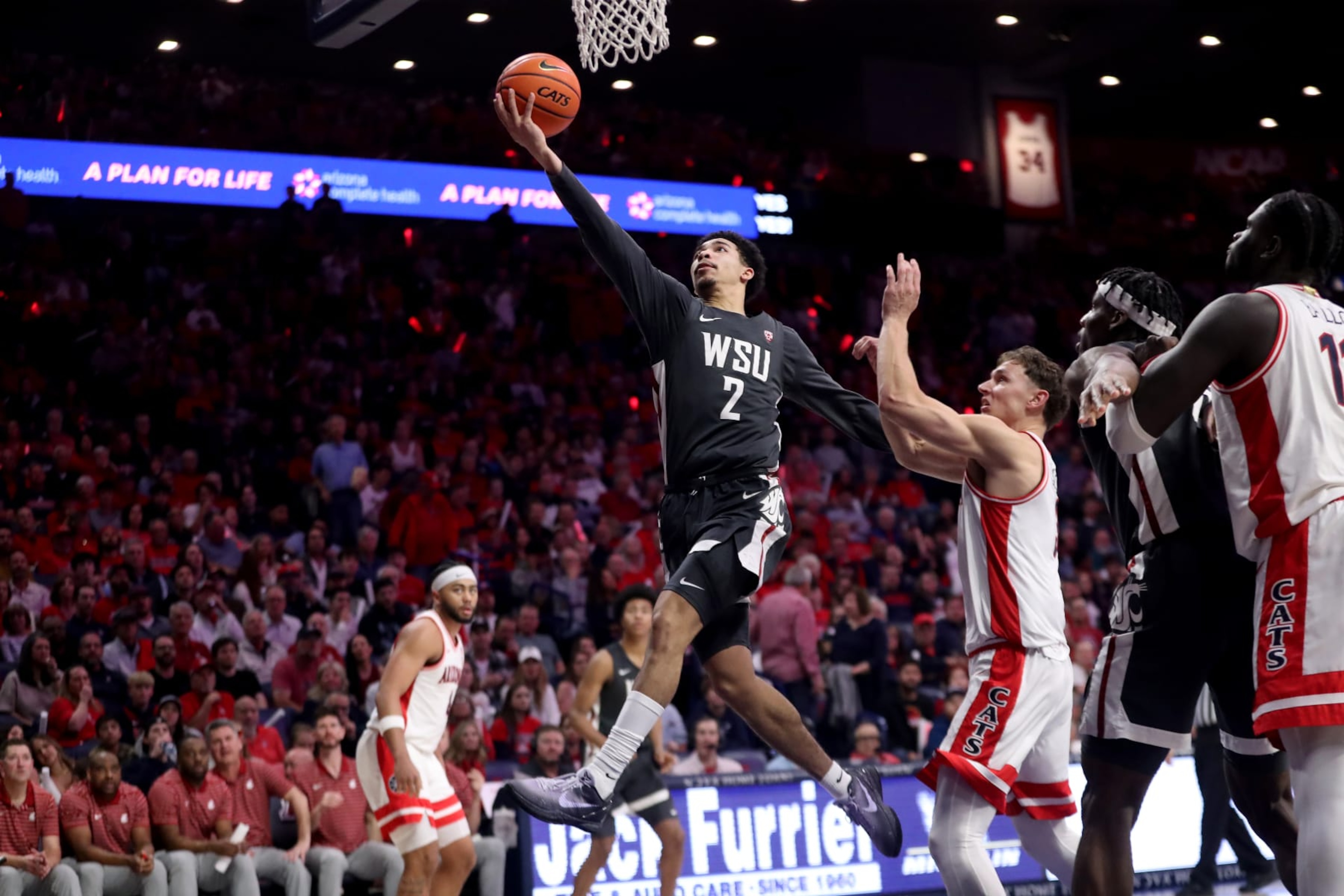 TUCSON, AZ - FEBRUARY 22: Washington State Cougars guard Myles Rice #2 during the second half of a men's basketball game between the Washington State Cougars and the University of Arizona Wildcats on February 22, 2024 at McKale Center in Tucson, AZ. (Photo by Christopher Hook/Icon Sportswire via Getty Images) TUCSON, AZ - FEBRUARY 22: Washington State Cougars guard Myles Rice #2 during the second half of a men's basketball game between the Washington State Cougars and the University of Arizona Wildcats on February 22, 2024 at McKale Center in Tucson, AZ. (Photo by Christopher Hook/Icon Sportswire via Getty Images)