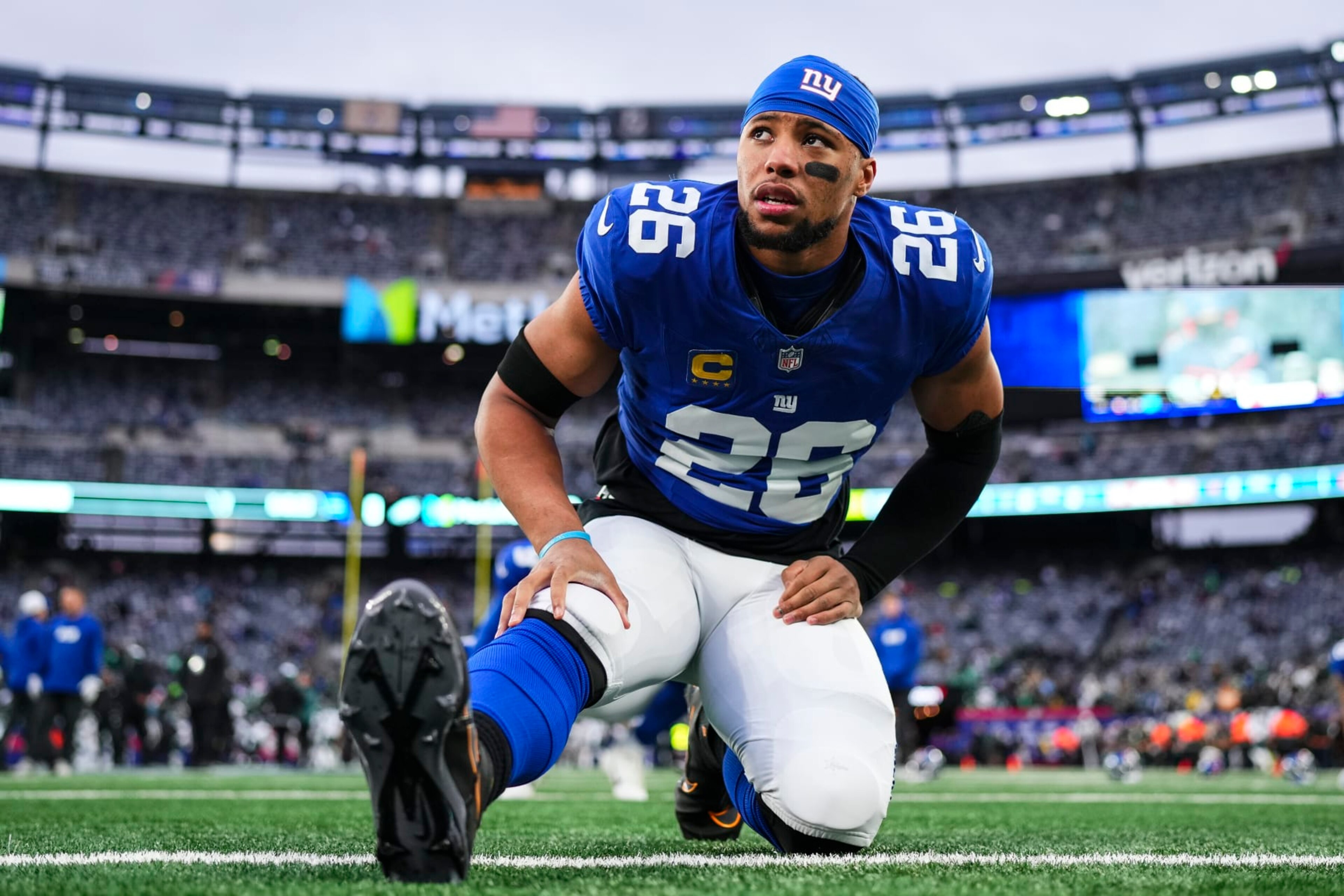 EAST RUTHERFORD, NJ - JANUARY 07: Saquon Barkley #26 of the New York Giants warms up prior to an NFL football game against the Philadelphia Eagles at MetLife Stadium on January 7, 2024 in East Rutherford, New Jersey. (Photo by Cooper Neill/Getty Images)
