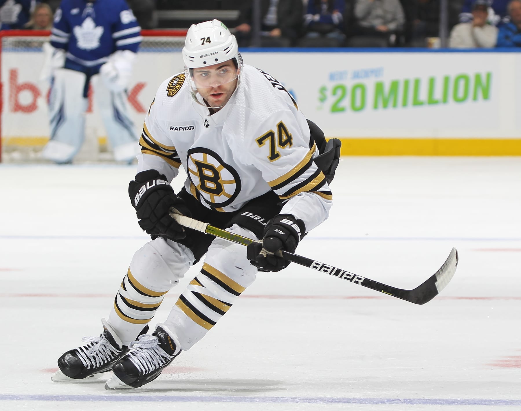 TORONTO, CANADA - MARCH 4:  Jake DeBrusk #74 of the Boston Bruins skates against the Toronto Maple Leafs during the second period in an NHL game at Scotiabank Arena on March 4, 2024 in Toronto, Ontario, Canada. The Bruins defeated the Maple Leafs 4-1. (Photo by Claus Andersen/Getty Images)