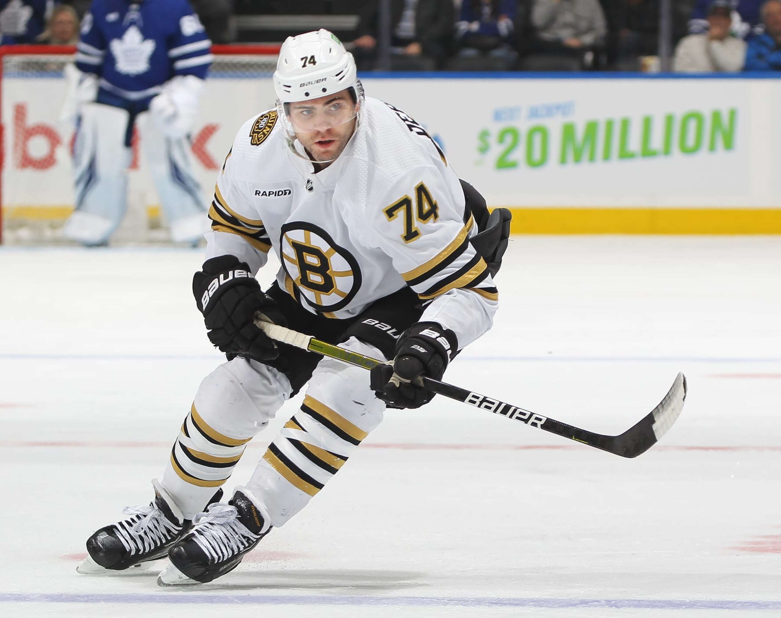 TORONTO, CANADA - MARCH 4:  Jake DeBrusk #74 of the Boston Bruins skates against the Toronto Maple Leafs during the second period in an NHL game at Scotiabank Arena on March 4, 2024 in Toronto, Ontario, Canada. The Bruins defeated the Maple Leafs 4-1. (Photo by Claus Andersen/Getty Images)