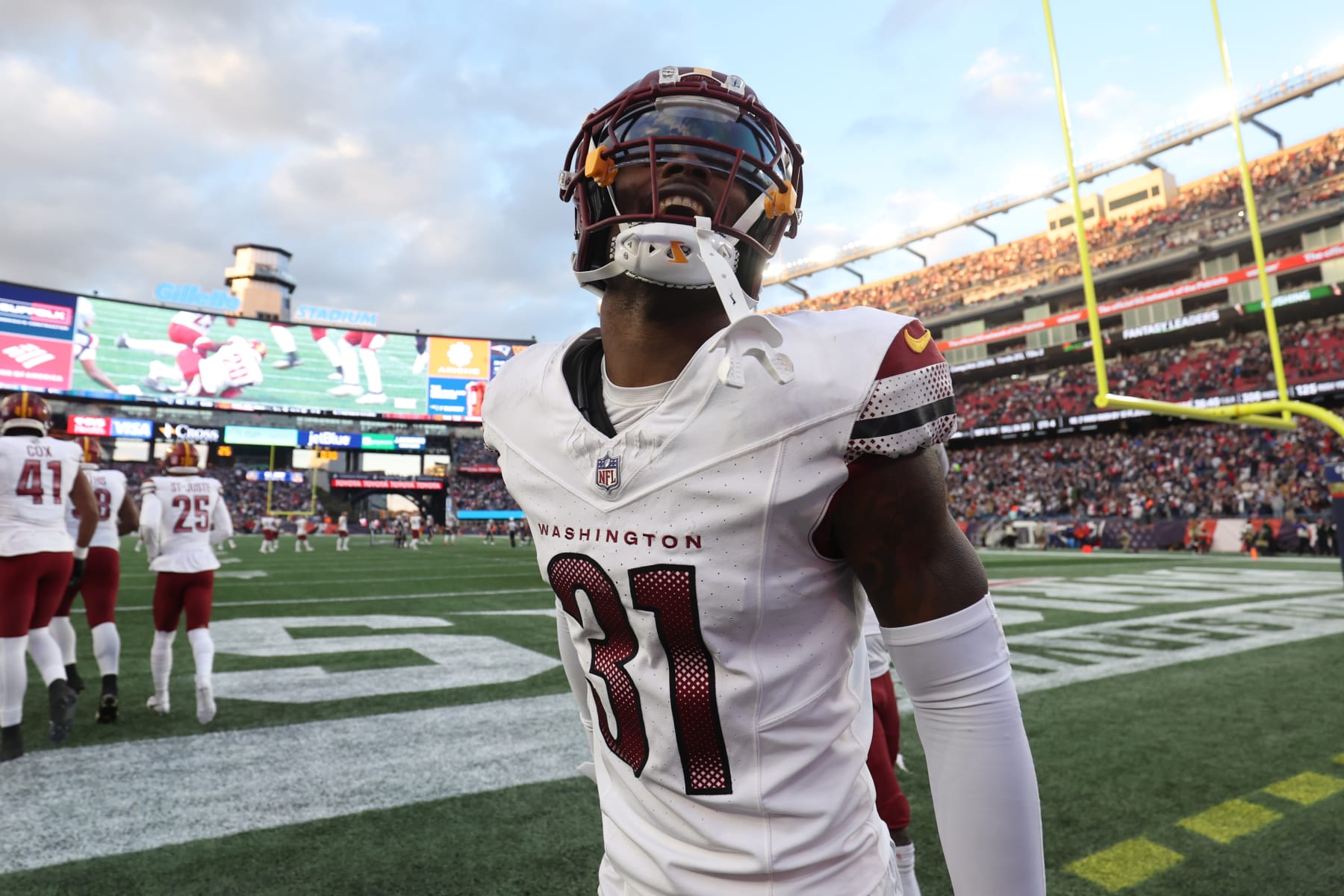 FOXBOROUGH, MASSACHUSETTS - NOVEMBER 05: Kamren Curl #31 of the Washington Commanders celebrates after an interception during the second half of the game against the New England Patriots at Gillette Stadium on November 05, 2023 in Foxborough, Massachusetts. (Photo by Adam Glanzman/Getty Images)
