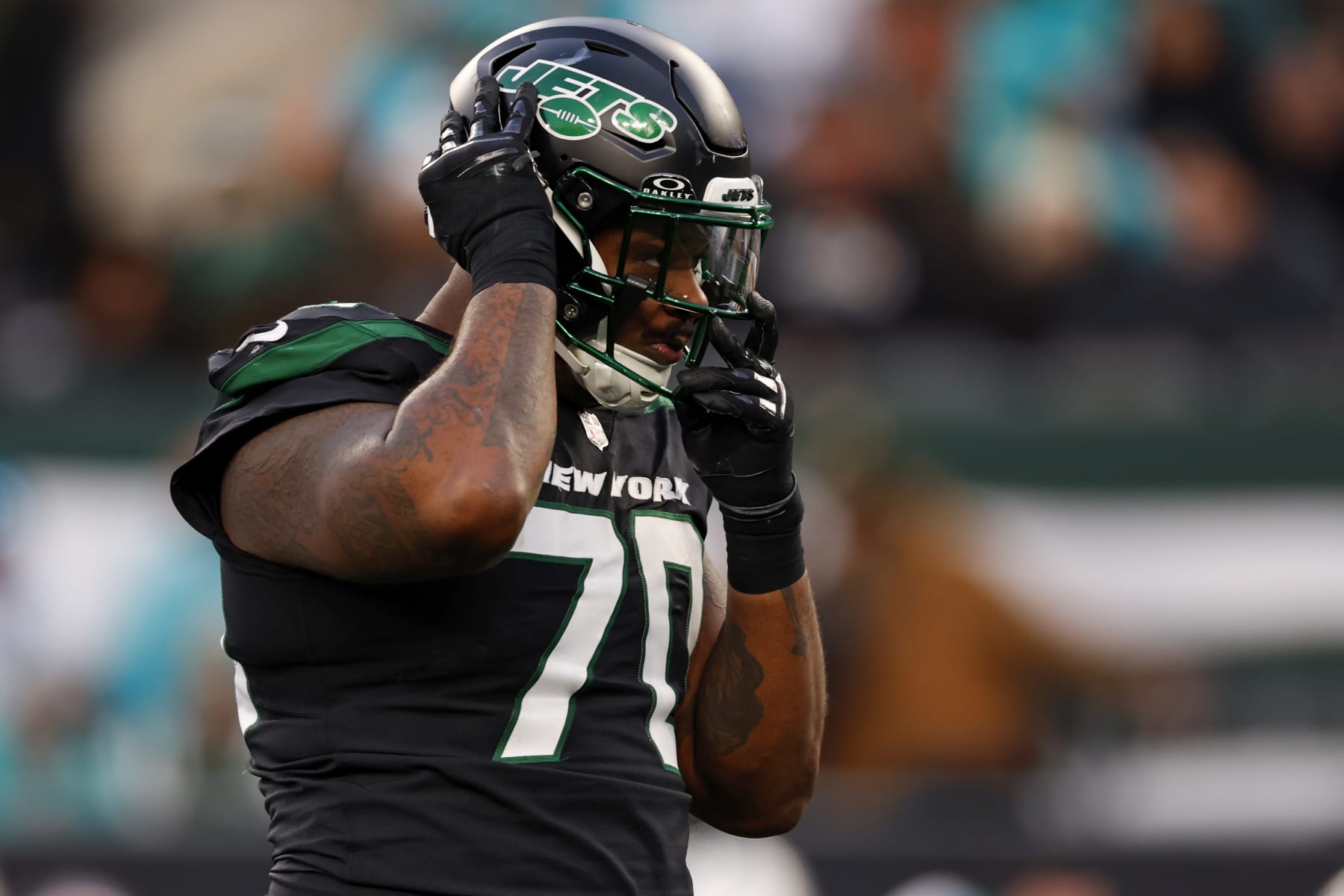 EAST RUTHERFORD, NEW JERSEY - NOVEMBER 24: Defensive tackle Quinton Jefferson #70 of the New York Jets in action against the Miami Dolphins during a football game at MetLife Stadium on November 24, 2023 in East Rutherford, New Jersey. (Photo by Rich Schultz/Getty Images)