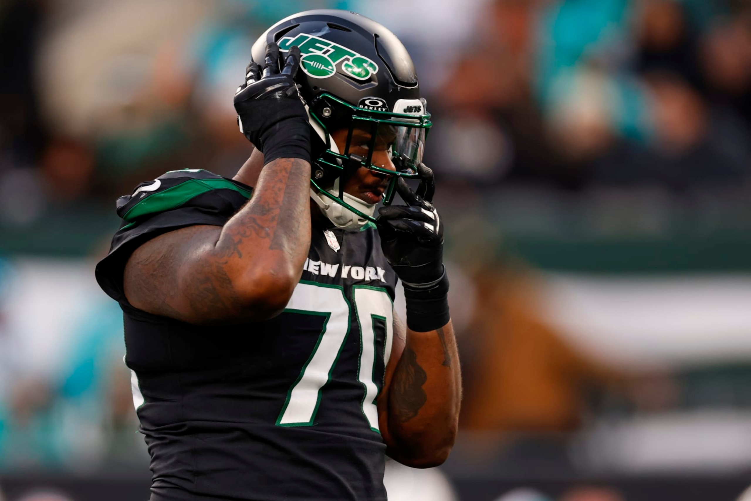 EAST RUTHERFORD, NEW JERSEY - NOVEMBER 24: Defensive tackle Quinton Jefferson #70 of the New York Jets in action against the Miami Dolphins during a football game at MetLife Stadium on November 24, 2023 in East Rutherford, New Jersey. (Photo by Rich Schultz/Getty Images)