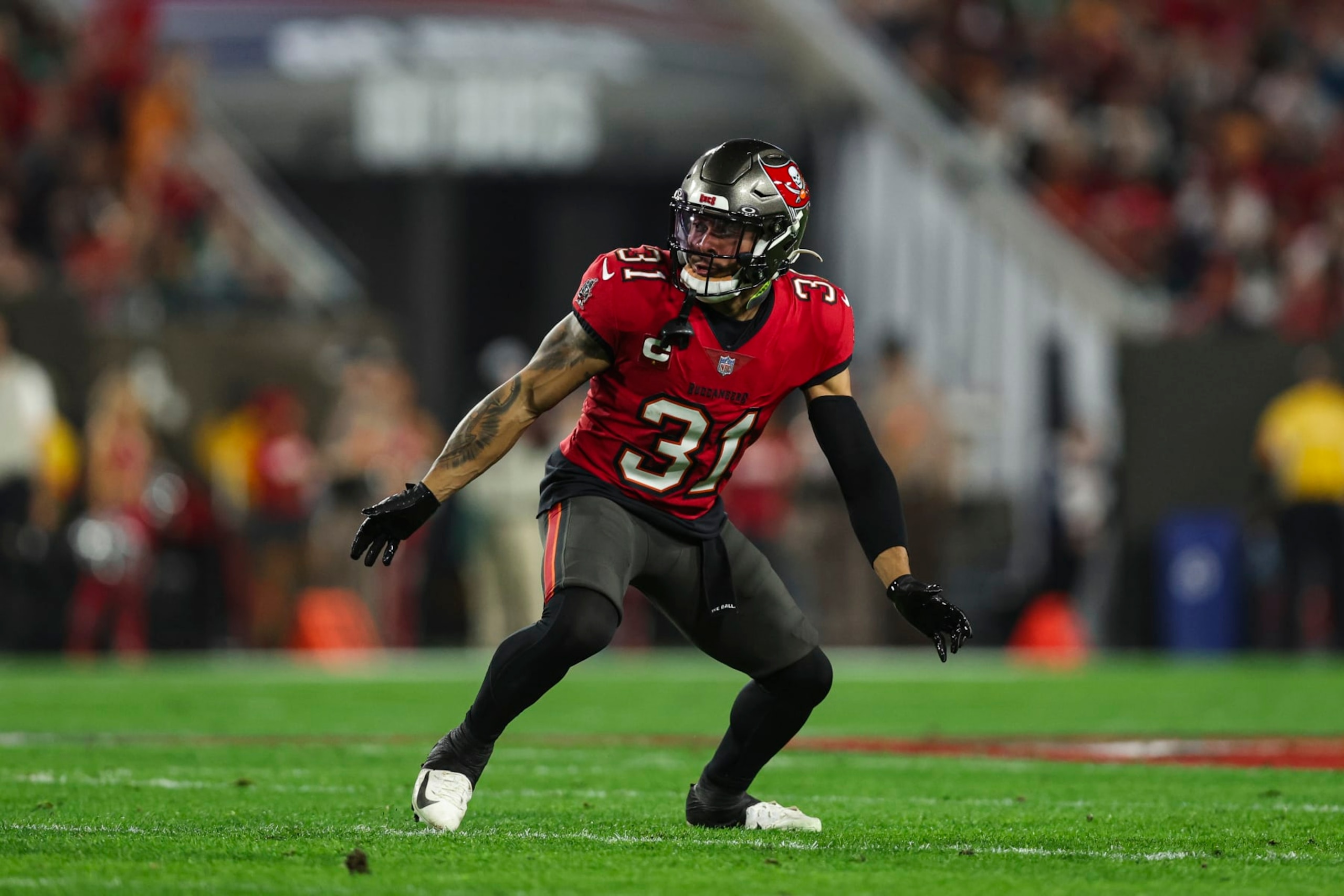 TAMPA, FL - JANUARY 15: Antoine Winfield Jr. #31 of the Tampa Bay Buccaneers defends in coverage during an NFL Wild Card playoff football game against the Philadelphia Eagles at Raymond James Stadium on January 15, 2024 in Tampa, Florida. (Photo by Perry Knotts/Getty Images)