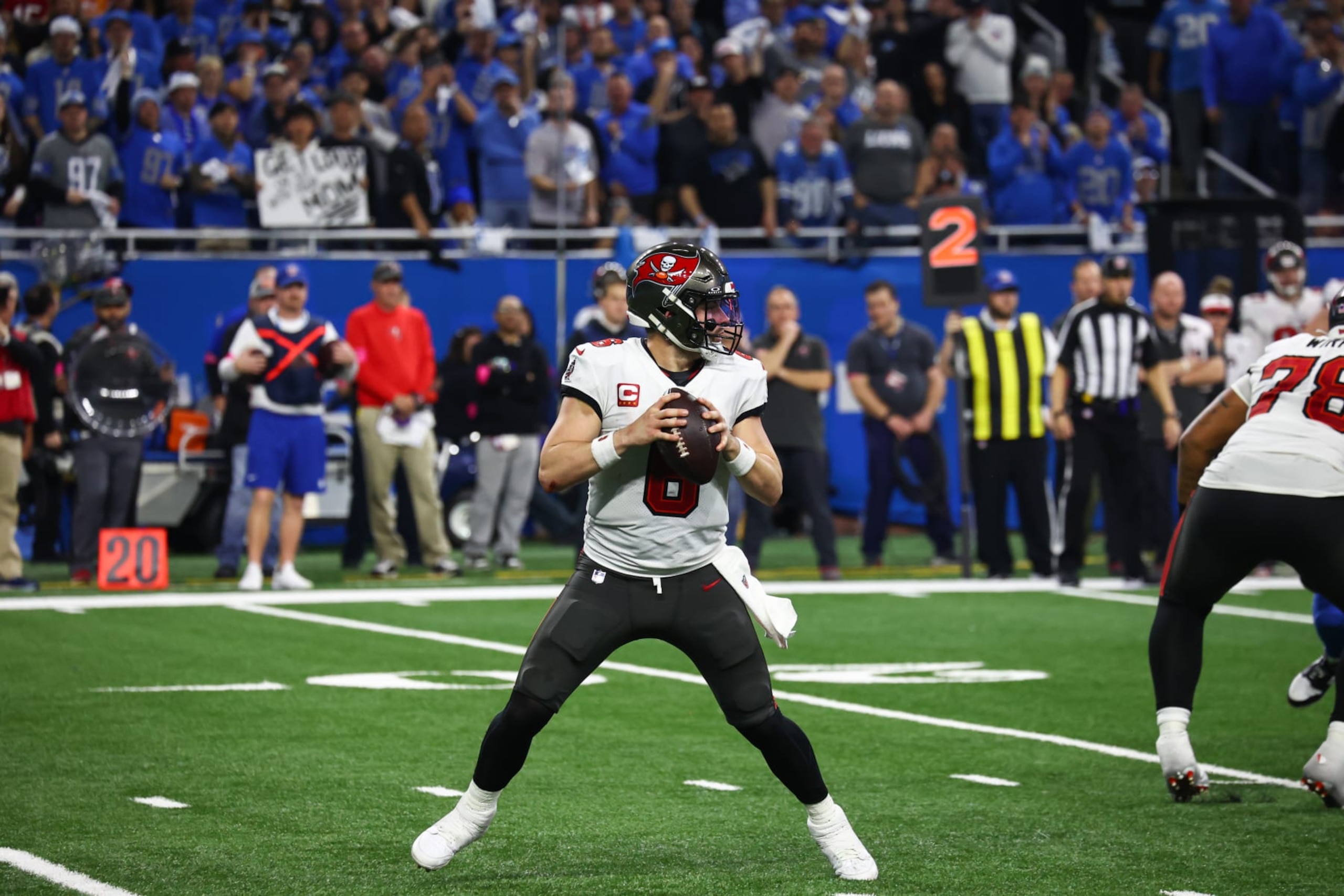 DETROIT, MI - JANUARY 21:  Tampa Bay Buccaneers quarterback Baker Mayfield (6) looks for a receiver during a play during an NFL NFC Divisional playoff football game between the Tampa Bay Buccaneers and the Detroit Lions on January 21, 2024 at Ford Field in Detroit, Michigan. (Photo by Scott W. Grau/Icon Sportswire via Getty Images)