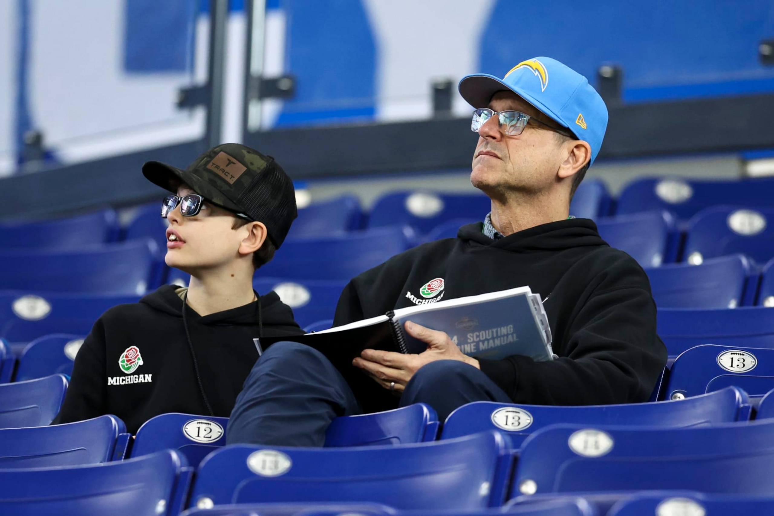 INDIANAPOLIS, INDIANA - MARCH 2: Head coach Jim Harbaugh of the Los Angeles Chargers watches from the stands during the NFL Combine at the Lucas Oil Stadium on March 2, 2024 in Indianapolis, Indiana. (Photo by Kevin Sabitus/Getty Images)