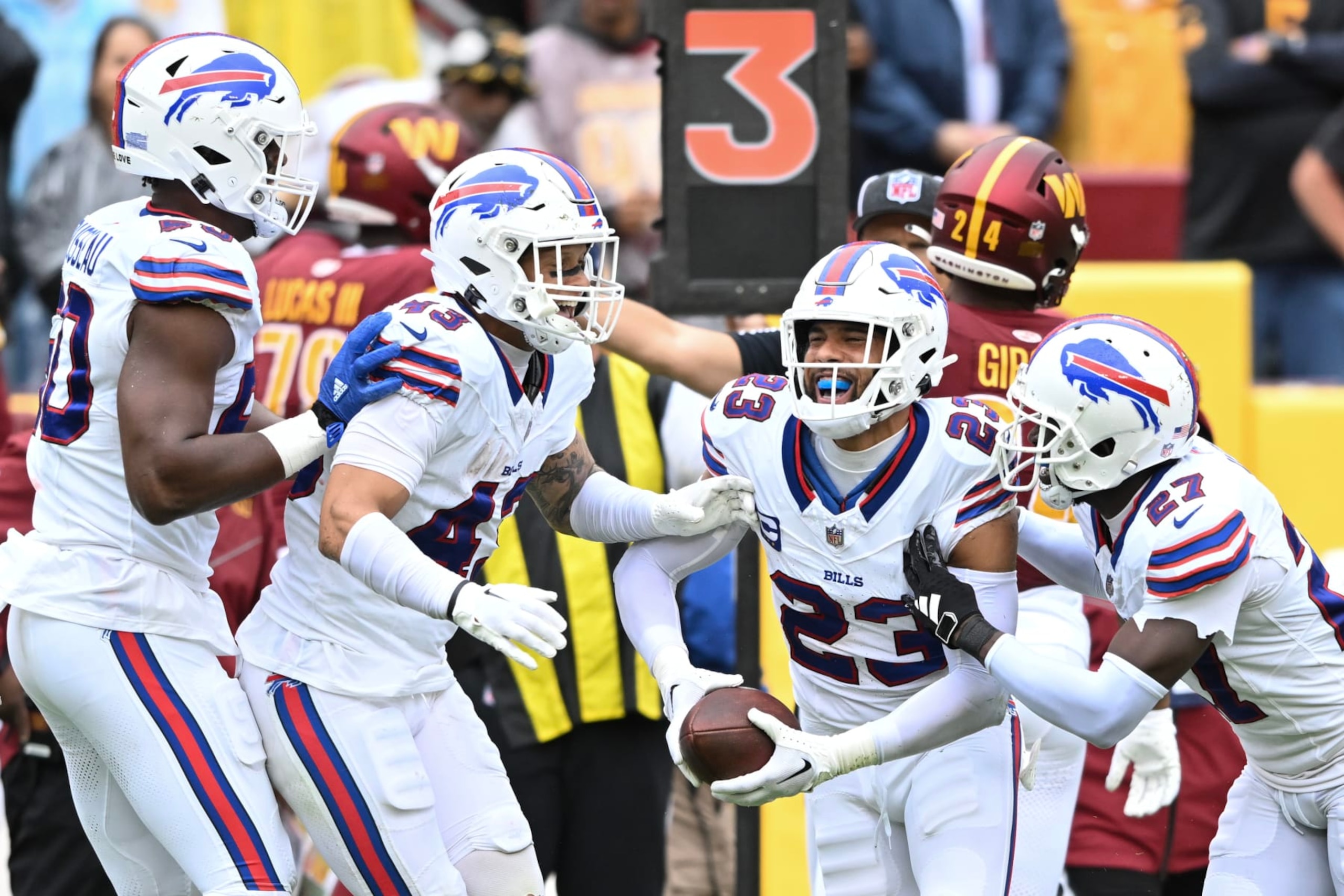 LANDOVER, MARYLAND - SEPTEMBER 24: Micah Hyde #23 of the Buffalo Bills celebrates his interception with teammates during the second quarter of a game against the Washington Commanders at FedExField on September 24, 2023 in Landover, Maryland. (Photo by Greg Fiume/Getty Images) LANDOVER, MARYLAND - SEPTEMBER 24: Micah Hyde #23 of the Buffalo Bills celebrates his interception with teammates during the second quarter of a game against the Washington Commanders at FedExField on September 24, 2023 in Landover, Maryland. (Photo by Greg Fiume/Getty Images)