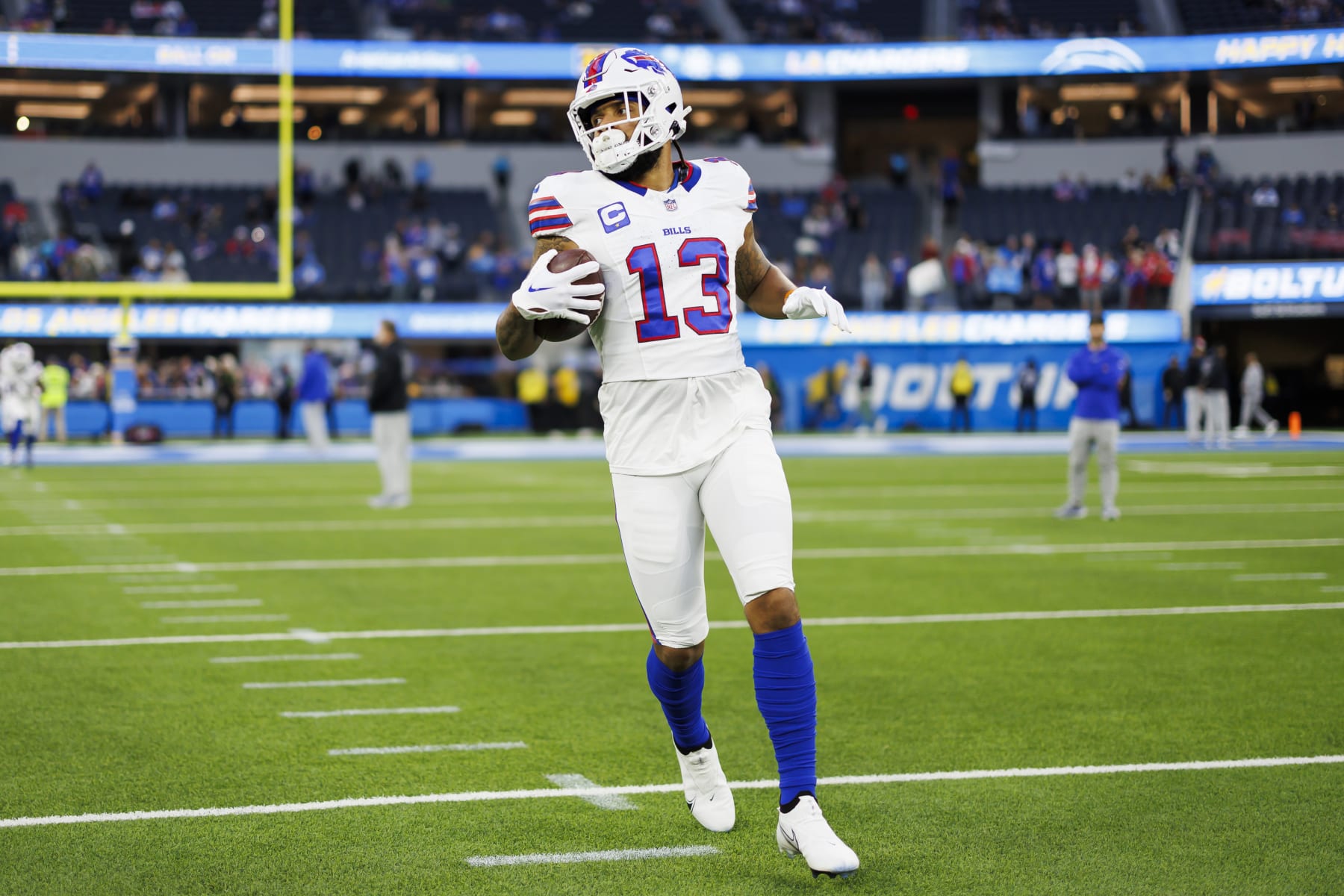 INGLEWOOD, CA - DECEMBER 23: Gabe Davis #13 of the Buffalo Bills runs the ball during pregame warmups before an NFL football game against the Los Angeles Chargers at SoFi Stadium on December 23, 2023 in Inglewood, California. (Photo by Ryan Kang/Getty Images)