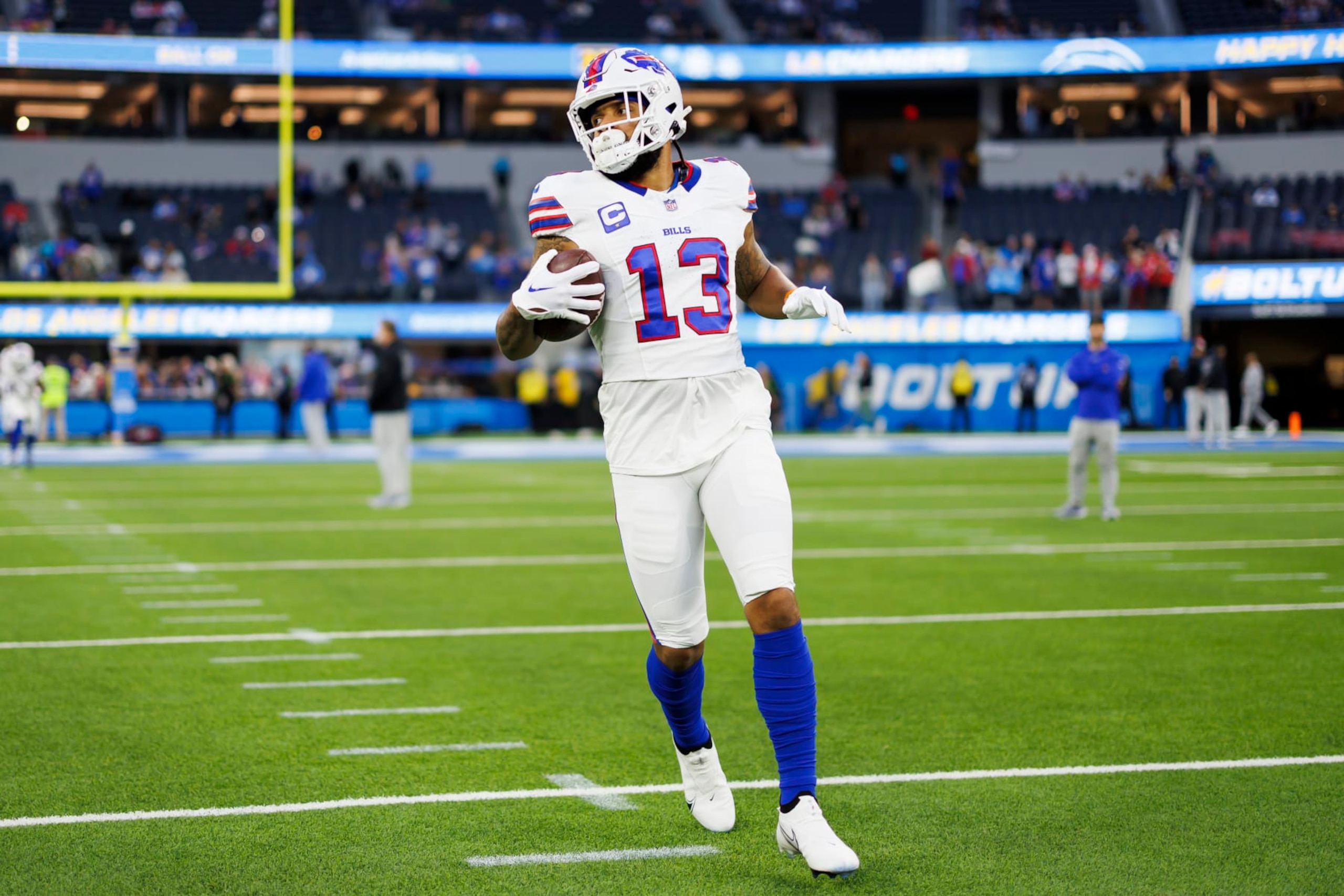 INGLEWOOD, CA - DECEMBER 23: Gabe Davis #13 of the Buffalo Bills runs the ball during pregame warmups before an NFL football game against the Los Angeles Chargers at SoFi Stadium on December 23, 2023 in Inglewood, California. (Photo by Ryan Kang/Getty Images) INGLEWOOD, CA - DECEMBER 23: Gabe Davis #13 of the Buffalo Bills runs the ball during pregame warmups before an NFL football game against the Los Angeles Chargers at SoFi Stadium on December 23, 2023 in Inglewood, California. (Photo by Ryan Kang/Getty Images)