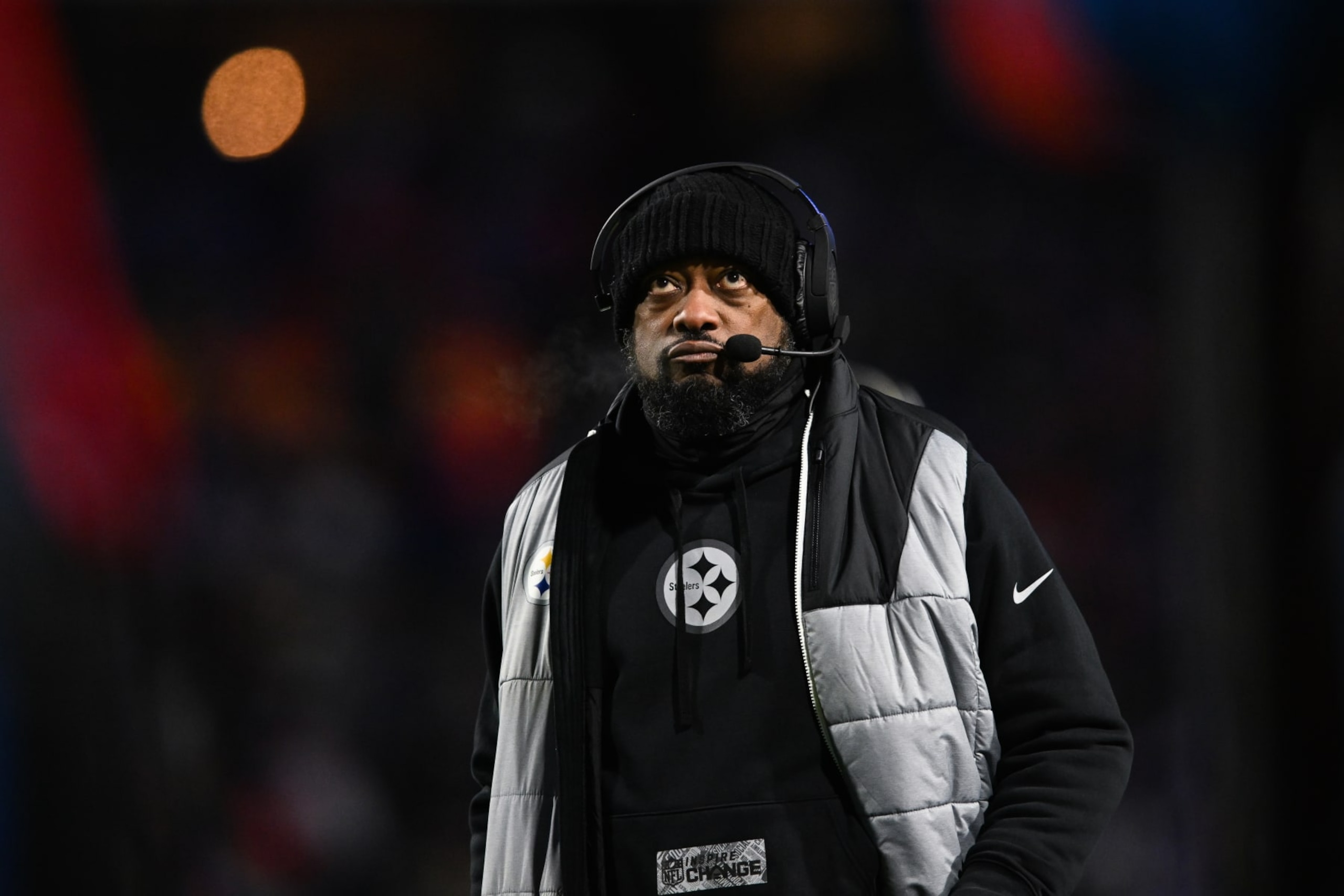 ORCHARD PARK, NY - JANUARY 15: Mike Tomlin, head coach of the Pittsburgh Steelers stands on the sidelines during the first half of the NFL wild-card playoff football game against the Buffalo Bills at Highmark Stadium on January 15, 2024 in Orchard Park, New York. (Photo by Kathryn Riley/Getty Images) ORCHARD PARK, NY - JANUARY 15: Mike Tomlin, head coach of the Pittsburgh Steelers stands on the sidelines during the first half of the NFL wild-card playoff football game against the Buffalo Bills at Highmark Stadium on January 15, 2024 in Orchard Park, New York. (Photo by Kathryn Riley/Getty Images)