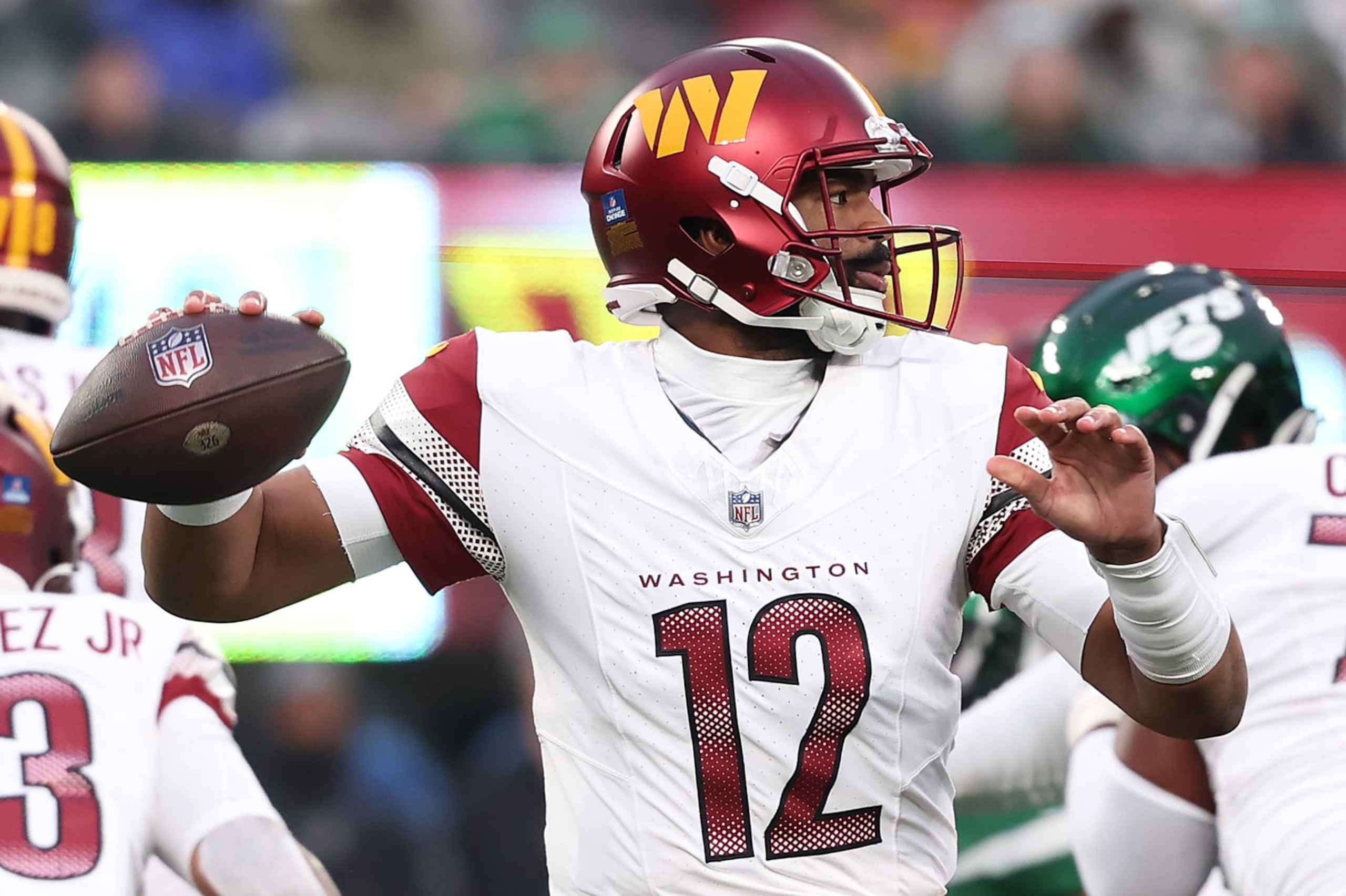EAST RUTHERFORD, NEW JERSEY - DECEMBER 24: Jacoby Brissett #12 of the Washington Commanders looks to throw a pass during the fourth quarter against the New York Jets at MetLife Stadium on December 24, 2023 in East Rutherford, New Jersey. (Photo by Dustin Satloff/Getty Images) EAST RUTHERFORD, NEW JERSEY - DECEMBER 24: Jacoby Brissett #12 of the Washington Commanders looks to throw a pass during the fourth quarter against the New York Jets at MetLife Stadium on December 24, 2023 in East Rutherford, New Jersey. (Photo by Dustin Satloff/Getty Images)