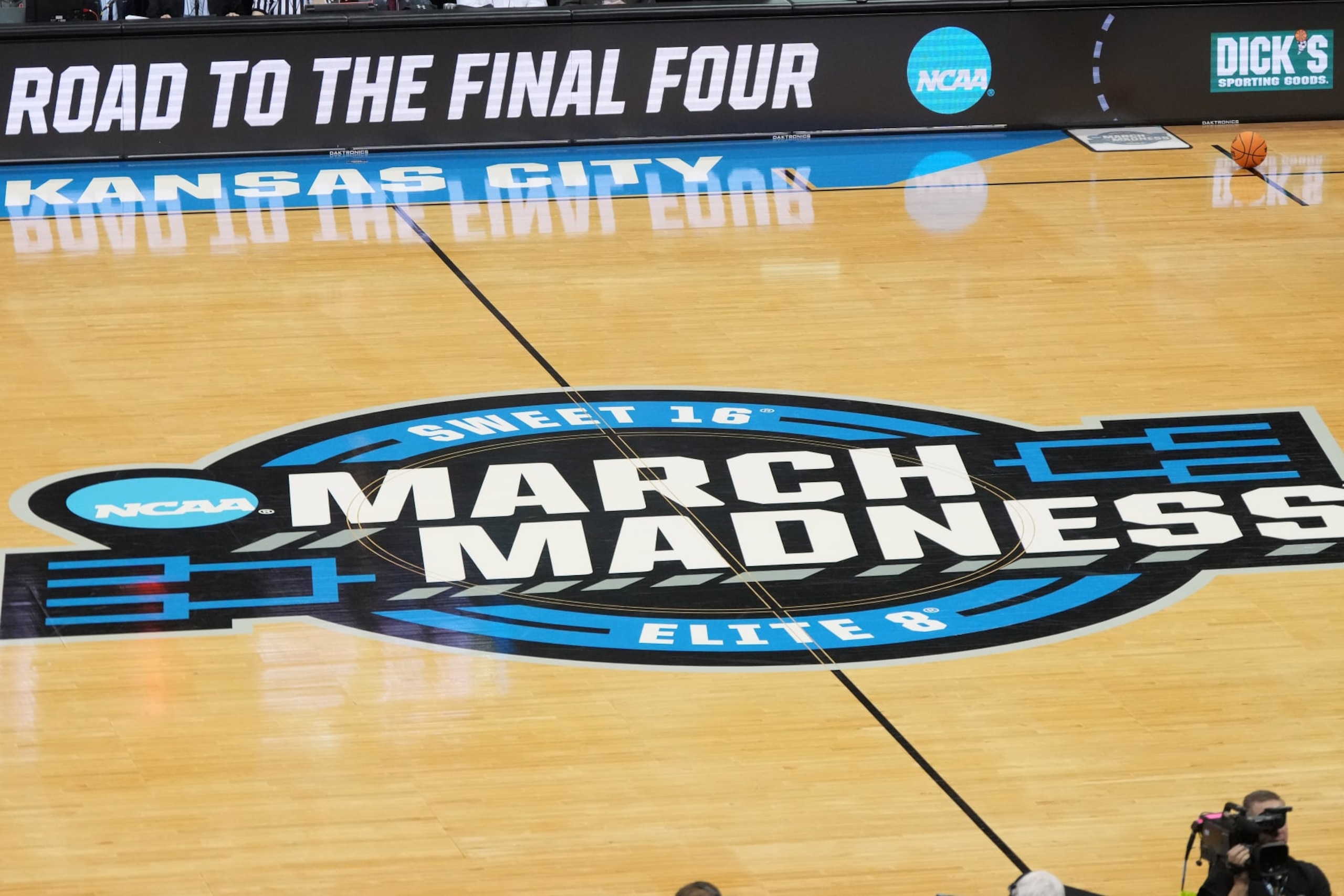 KANSAS CITY, MISSOURI - MARCH 26:  The Elite 8 Sweet 16 logo on the floor during the Elite Eight round of the NCAA Men's Basketball Tournament between the Miami (Fl) Hurricanes and the Texas Longhorns at T-Mobile Center on March 26, 2023 in Kansas City, Missouri.  (Photo by Mitchell Layton/Getty Images)