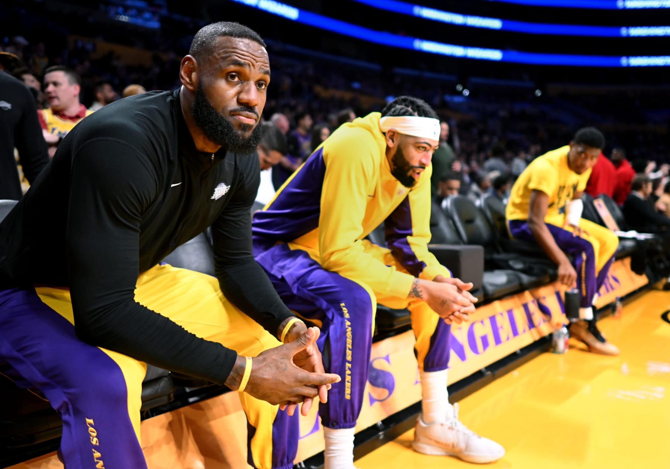 Los Angeles, California February 29, 2024-Lakers LeBron James, left, and Anthony Davis wait for introductions before a game with the Wizards at Crypto.com Arena Thursday.  (Wally Skalij/Los Angeles Times via Getty Images)