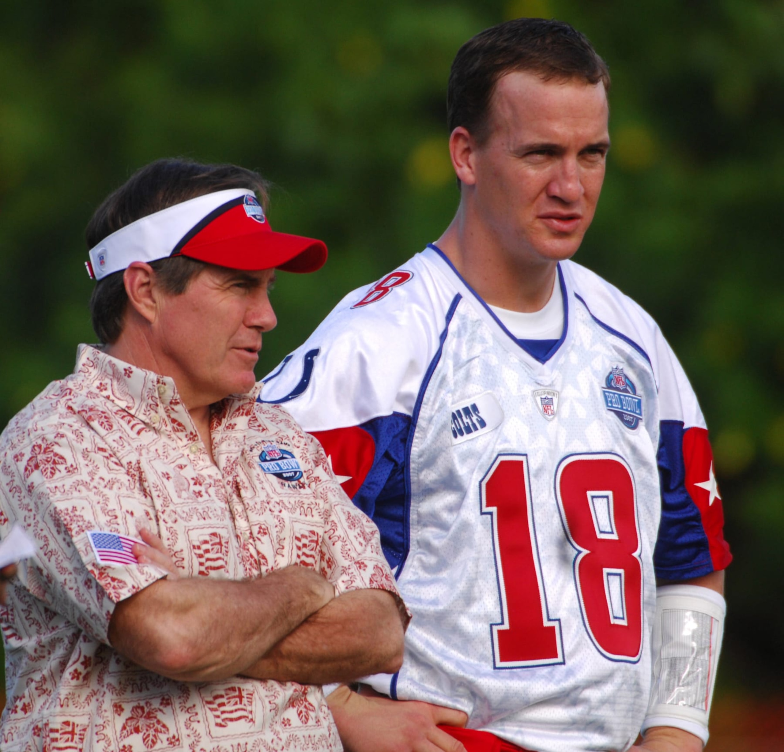 New England Patriots coach Bill Belichick talks with Indianapolis Colts quarterback Peyton Manning during NFL Pro Bowl AFC Practice at the Ihilani Resort in Kapoli, HI on Thursday, February 8, 2007. (Photo by Kirby Lee/Getty Images)