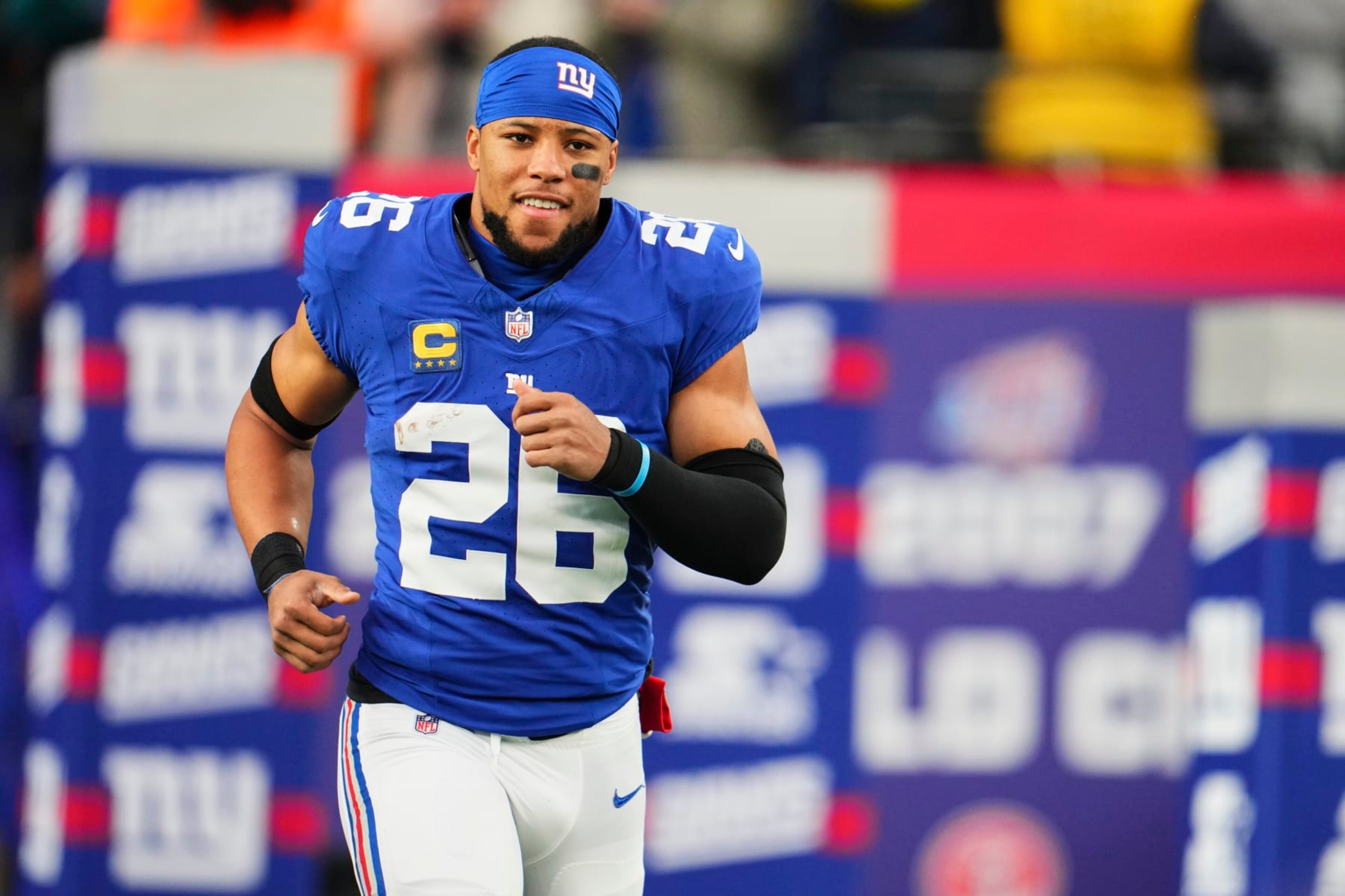 EAST RUTHERFORD, NJ - JANUARY 07: Saquon Barkley #26 of the New York Giants takes the field before kickoff against the Philadelphia Eagles at MetLife Stadium on January 7, 2024 in East Rutherford, New Jersey. (Photo by Cooper Neill/Getty Images) EAST RUTHERFORD, NJ - JANUARY 07: Saquon Barkley #26 of the New York Giants takes the field before kickoff against the Philadelphia Eagles at MetLife Stadium on January 7, 2024 in East Rutherford, New Jersey. (Photo by Cooper Neill/Getty Images)
