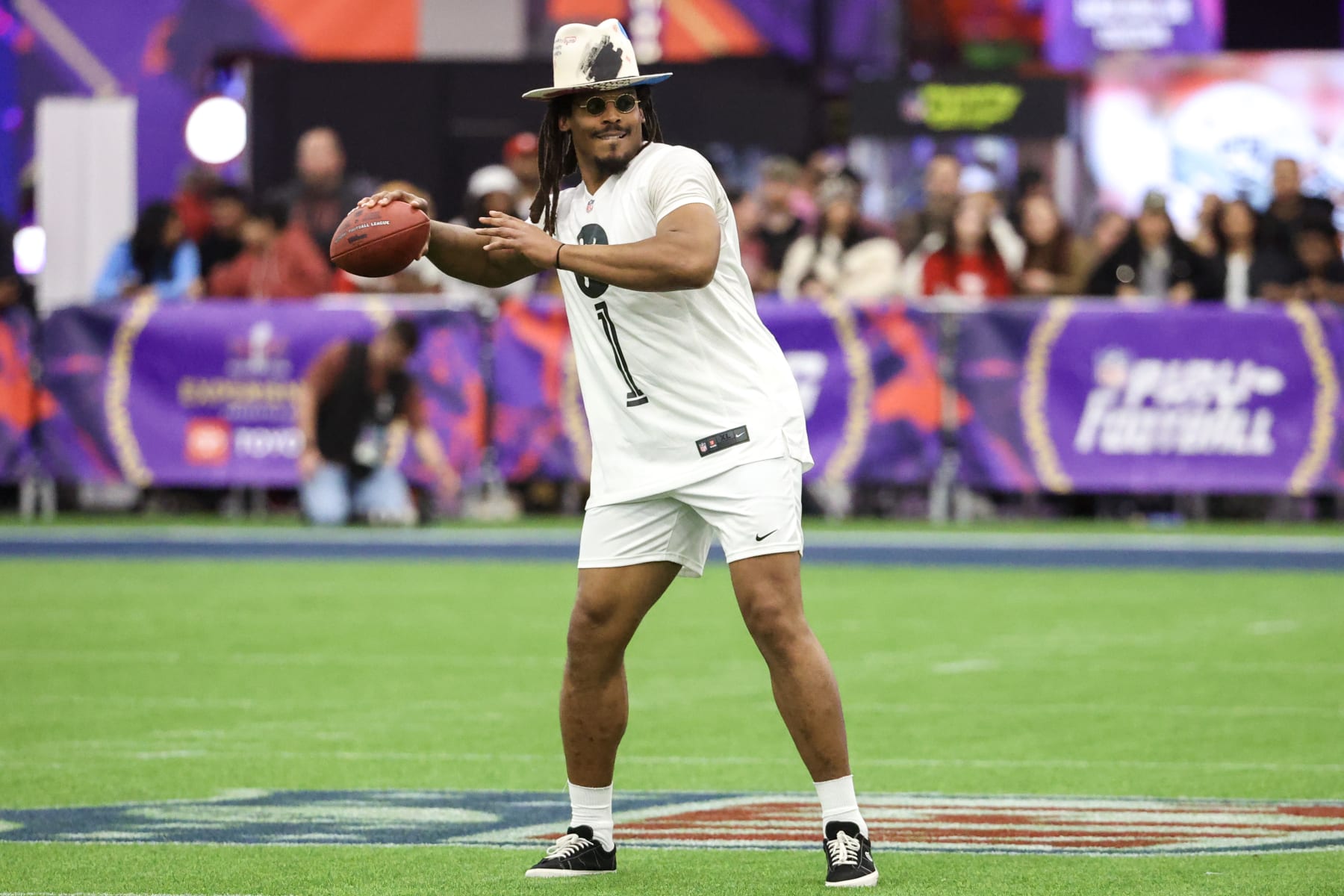 LAS VEGAS, NEVADA - FEBRUARY 09: Former NFL quarterback Cam Newton attempts a pass during a celebrity flag football game at the Mandalay Bay Convention Center on February 09, 2024 in Las Vegas, Nevada. (Photo by Ian Maule/Getty Images)