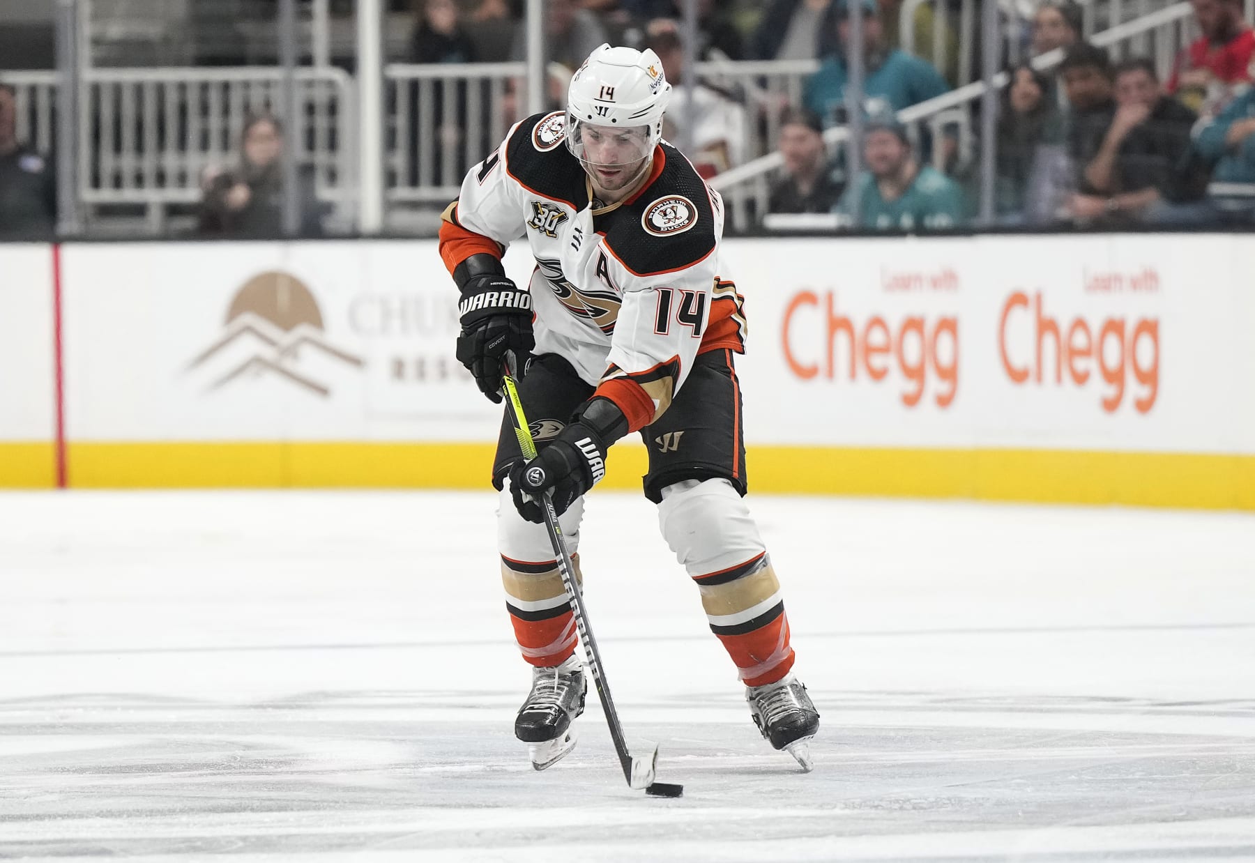 SAN JOSE, CALIFORNIA - FEBRUARY 29: Adam Henrique #14 of the Anaheim Ducks skates up ice with control of the puck against the San Jose Sharks in the third period of an NHL hockey game at SAP Center on February 29, 2024 in San Jose, California. (Photo by Thearon W. Henderson/Getty Images)