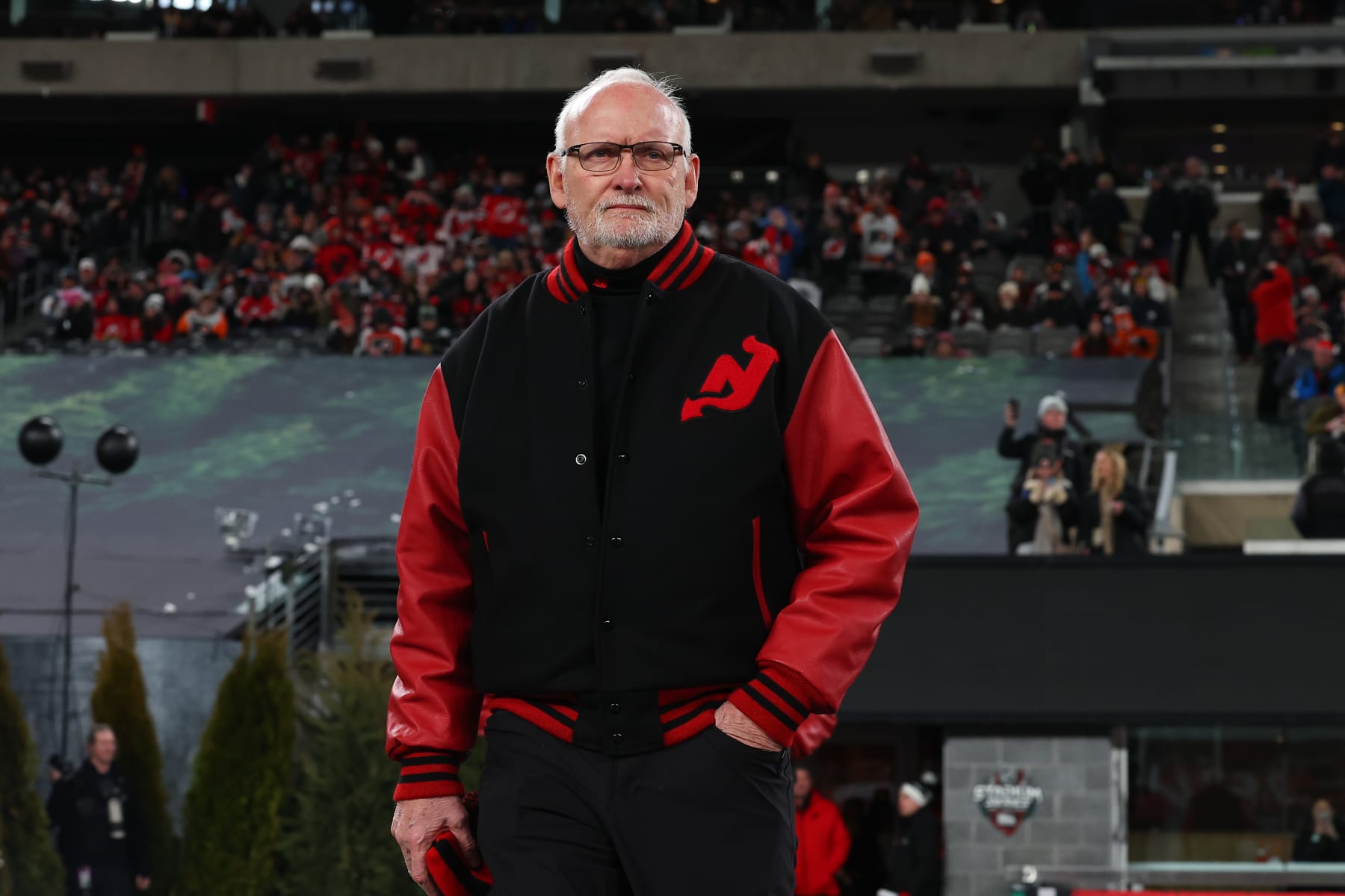 EAST RUTHERFORD, NJ - FEBRUARY 17:  Lindy Ruff head coach of the New Jersey Devils walks out to the bench prior to the 2024 Navy Federal Credit Union Stadium Series game against the New Jersey Devils at MetLife Stadium on February 17, 2024 in East Rutherford, New Jersey.  (Photo by Rich Graessle/NHLI via Getty Images)