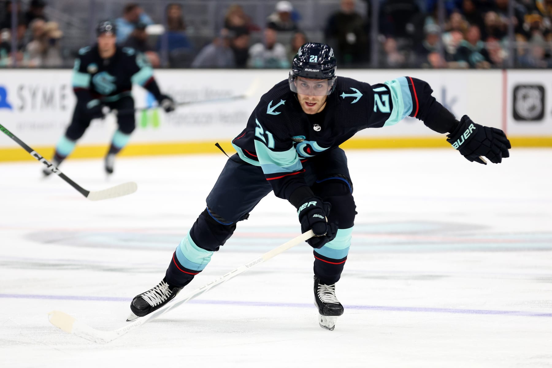 SEATTLE, WASHINGTON - FEBRUARY 29: Alex Wennberg #21 of the Seattle Kraken skates against the Pittsburgh Penguins during the second period at Climate Pledge Arena on February 29, 2024 in Seattle, Washington. (Photo by Steph Chambers/Getty Images)