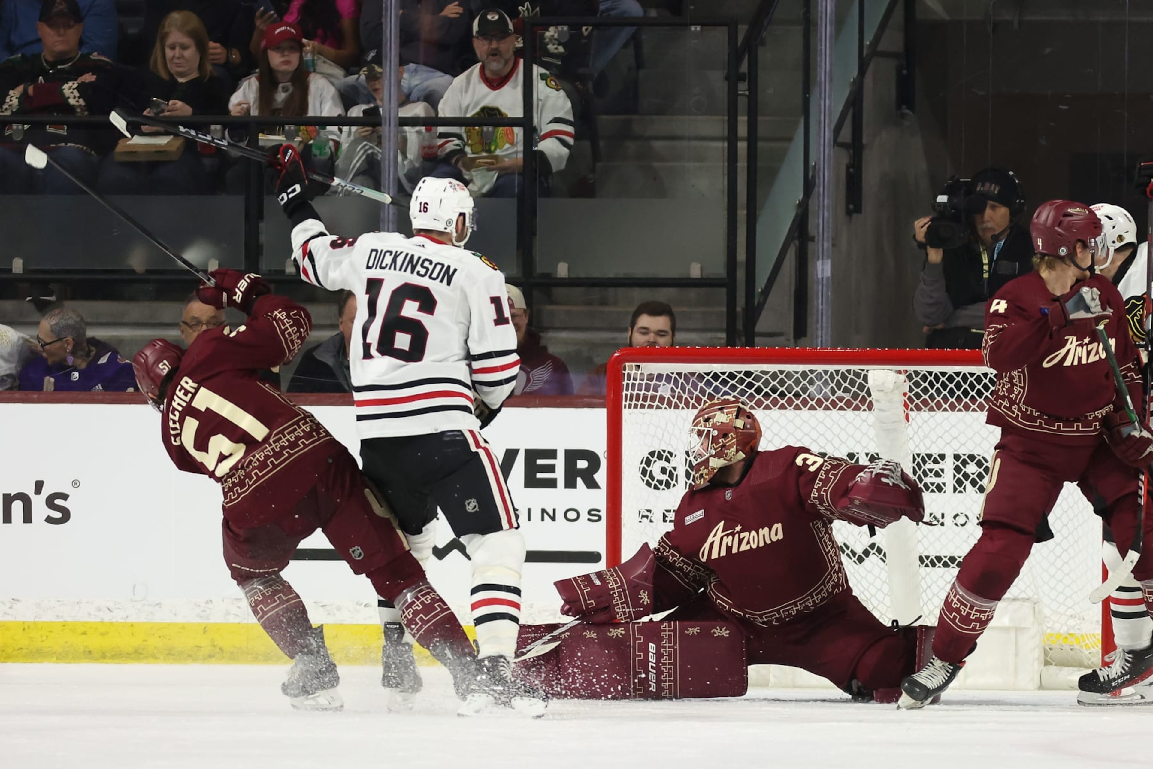 TEMPE, ARIZONA - MARCH 05: Jason Dickinson #16 of the Chicago Blackhawks scores a power-play goal against goaltender Connor Ingram #39 of the Arizona Coyotes during the second period of the NHL game at Mullett Arena on March 05, 2024 in Tempe, Arizona. (Photo by Christian Petersen/Getty Images) TEMPE, ARIZONA - MARCH 05: Jason Dickinson #16 of the Chicago Blackhawks scores a power-play goal against goaltender Connor Ingram #39 of the Arizona Coyotes during the second period of the NHL game at Mullett Arena on March 05, 2024 in Tempe, Arizona. (Photo by Christian Petersen/Getty Images)