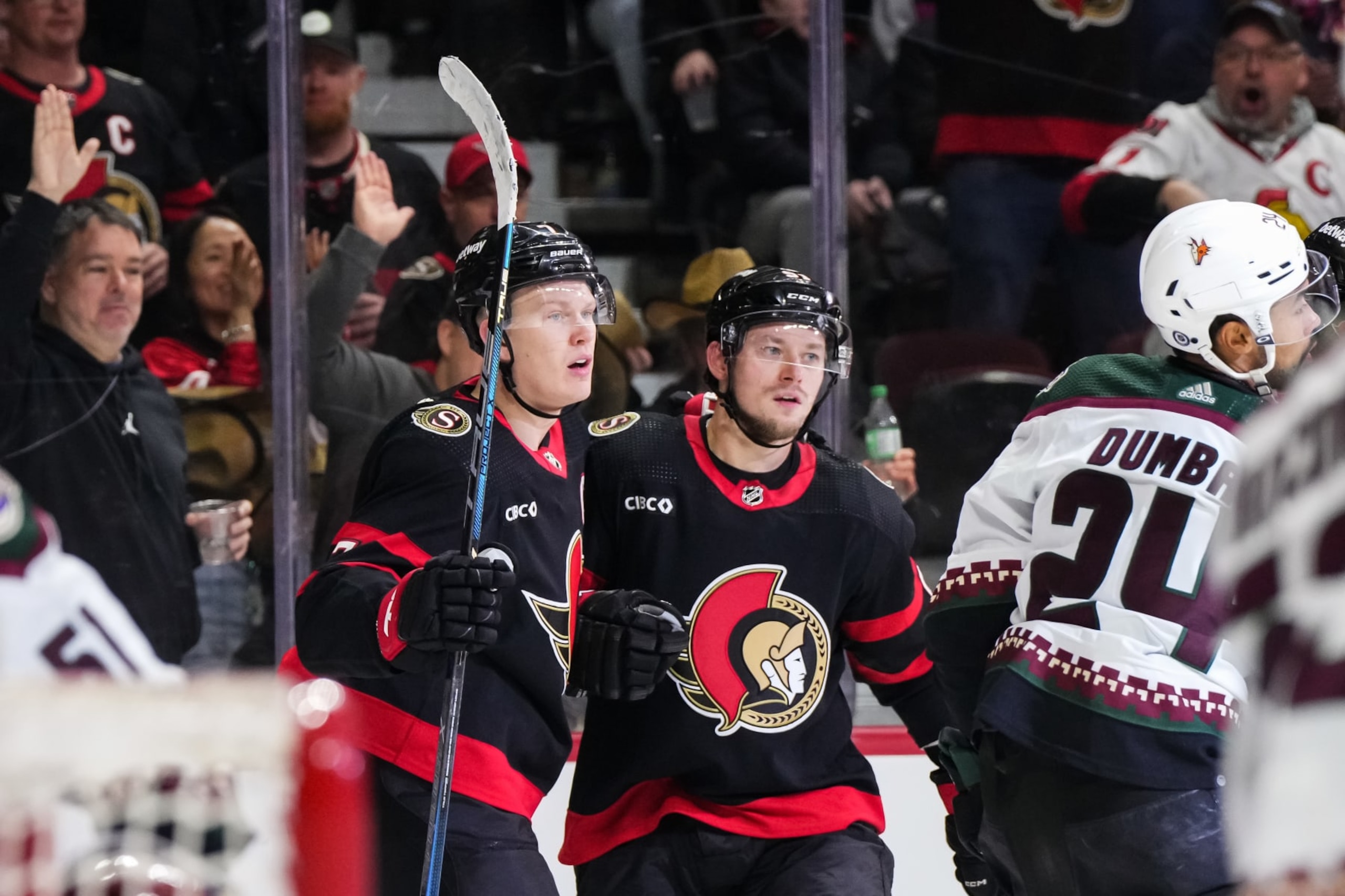 OTTAWA, CANADA - MARCH 1: Vladimir Tarasenko #91 of the Ottawa Senators celebrates his first period goal against the Arizona Coyotes with teammate Brady Tkachuk #7 at Canadian Tire Centre on March 1, 2024 in Ottawa, Ontario, Canada.  (Photo by Andrea Cardin/NHLI via Getty Images)