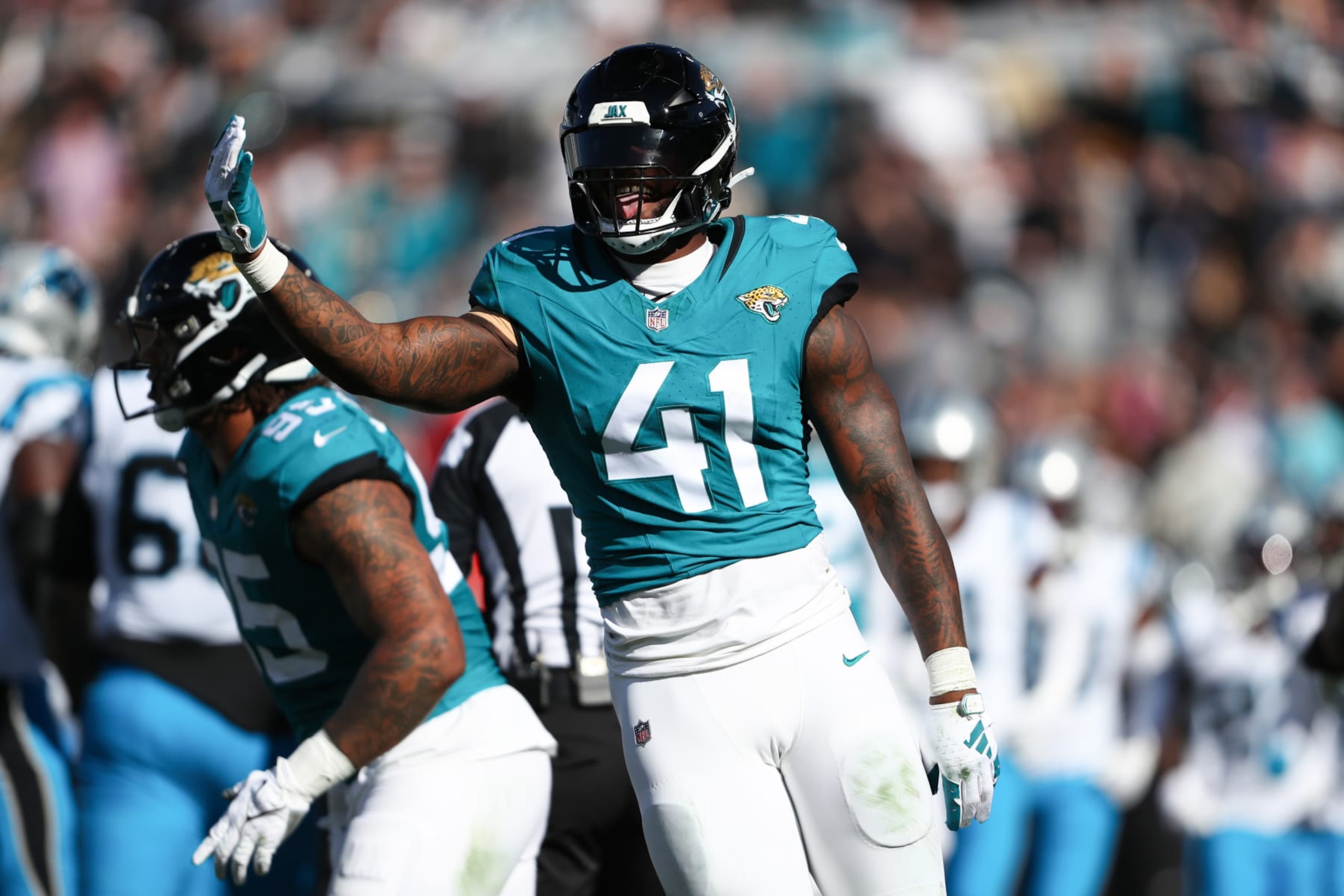 JACKSONVILLE, FLORIDA - DECEMBER 31: Josh Allen #41 of the Jacksonville Jaguars celebrates after a sack during the second quarter against the Carolina Panthers at EverBank Stadium on December 31, 2023 in Jacksonville, Florida. (Photo by Courtney Culbreath/Getty Images) JACKSONVILLE, FLORIDA - DECEMBER 31: Josh Allen #41 of the Jacksonville Jaguars celebrates after a sack during the second quarter against the Carolina Panthers at EverBank Stadium on December 31, 2023 in Jacksonville, Florida. (Photo by Courtney Culbreath/Getty Images)