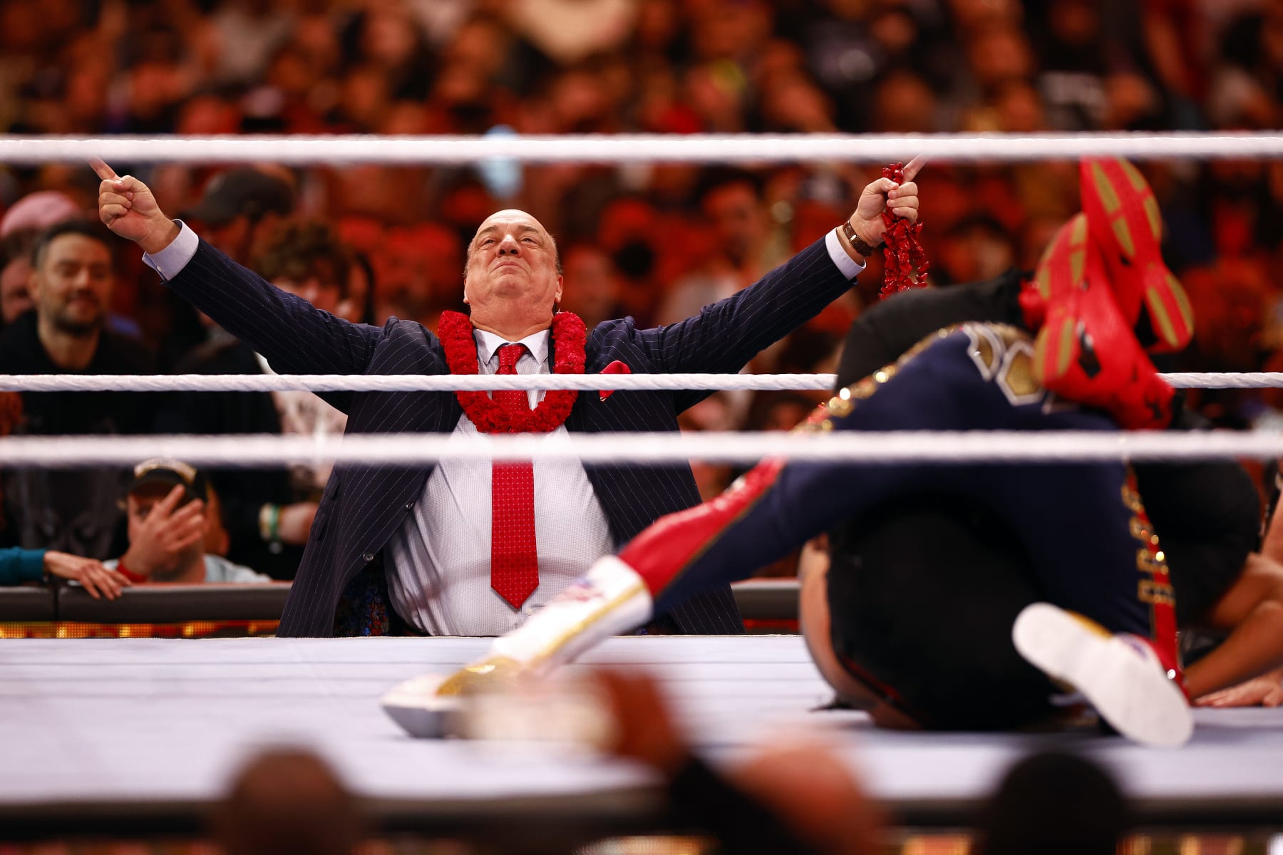 INGLEWOOD, CALIFORNIA - APRIL 02:  (L-R) Paul Heyman watches Cody Rhodes wrestle Roman Reigns for Undisputed WWE Universal Title Match during WrestleMania Goes Hollywood at SoFi Stadium on April 02, 2023 in Inglewood, California.
 (Photo by Ronald Martinez/Getty Images)