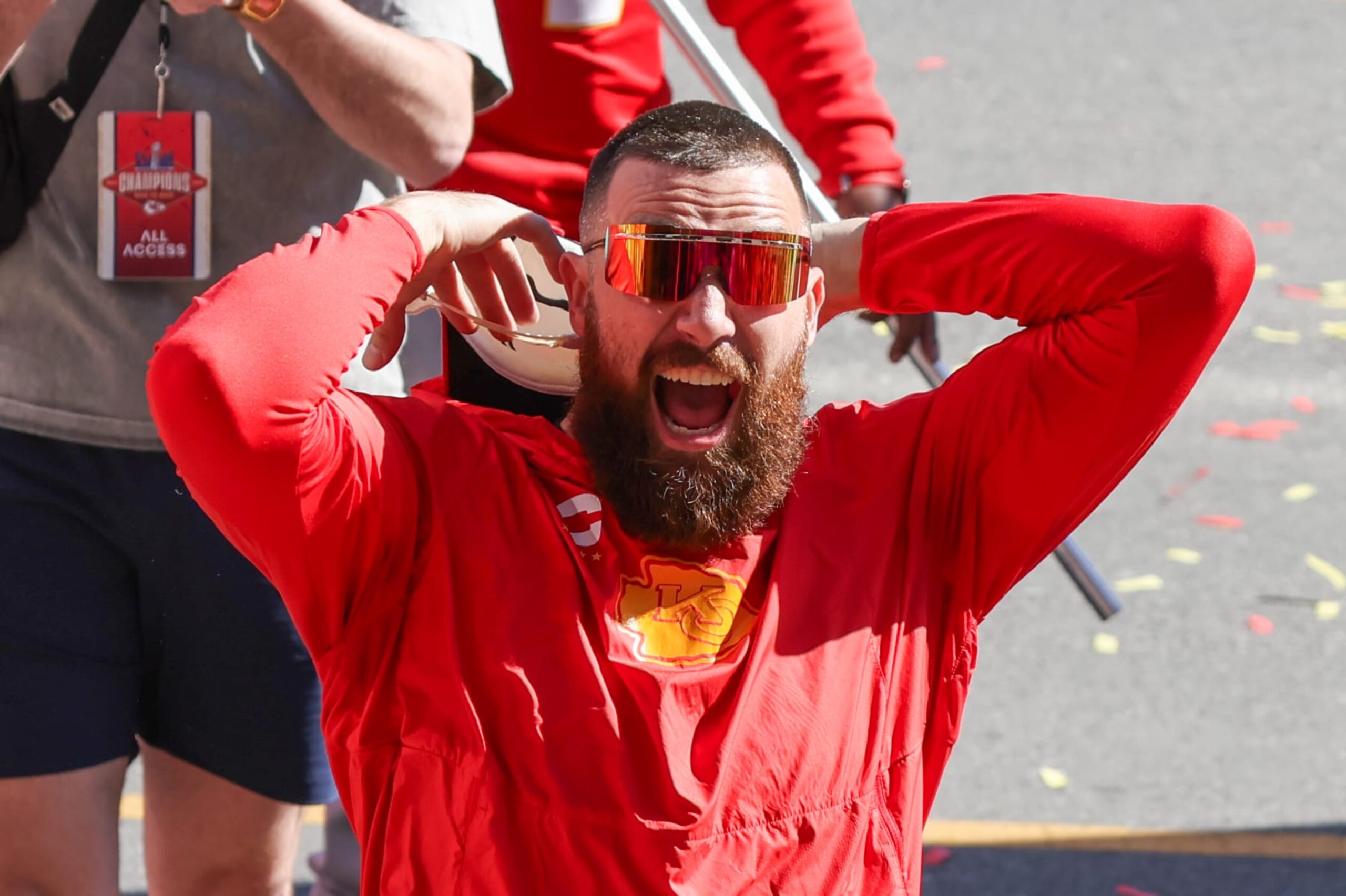 KANSAS CITY, MO - FEBRUARY 14: Travis Kelce yells and raises his hands to fire up the crowd during the Kansas City Chiefs Super Bowl LVIII Victory Parade on Feb 14, 2024 in Kansas City, MO. (Photo by Scott Winters/Icon Sportswire via Getty Images) KANSAS CITY, MO - FEBRUARY 14: Travis Kelce yells and raises his hands to fire up the crowd during the Kansas City Chiefs Super Bowl LVIII Victory Parade on Feb 14, 2024 in Kansas City, MO. (Photo by Scott Winters/Icon Sportswire via Getty Images)