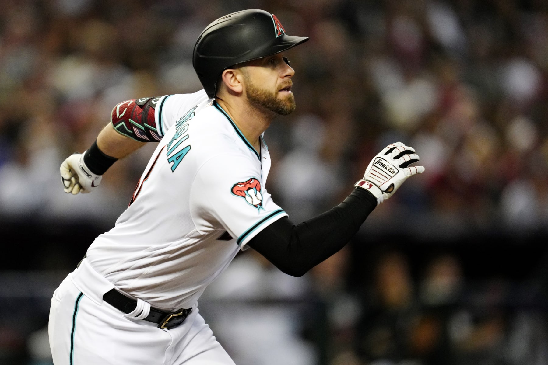 PHOENIX, AZ - NOVEMBER 01:  Evan Longoria #3 of the Arizona Diamondbacks doubles in the fourth inning during Game 5 of the 2023 World Series between the Texas Rangers and the Arizona Diamondbacks at Chase Field on Wednesday, November 1, 2023 in Phoenix, Arizona. (Photo by Mary DeCicco/MLB Photos via Getty Images)