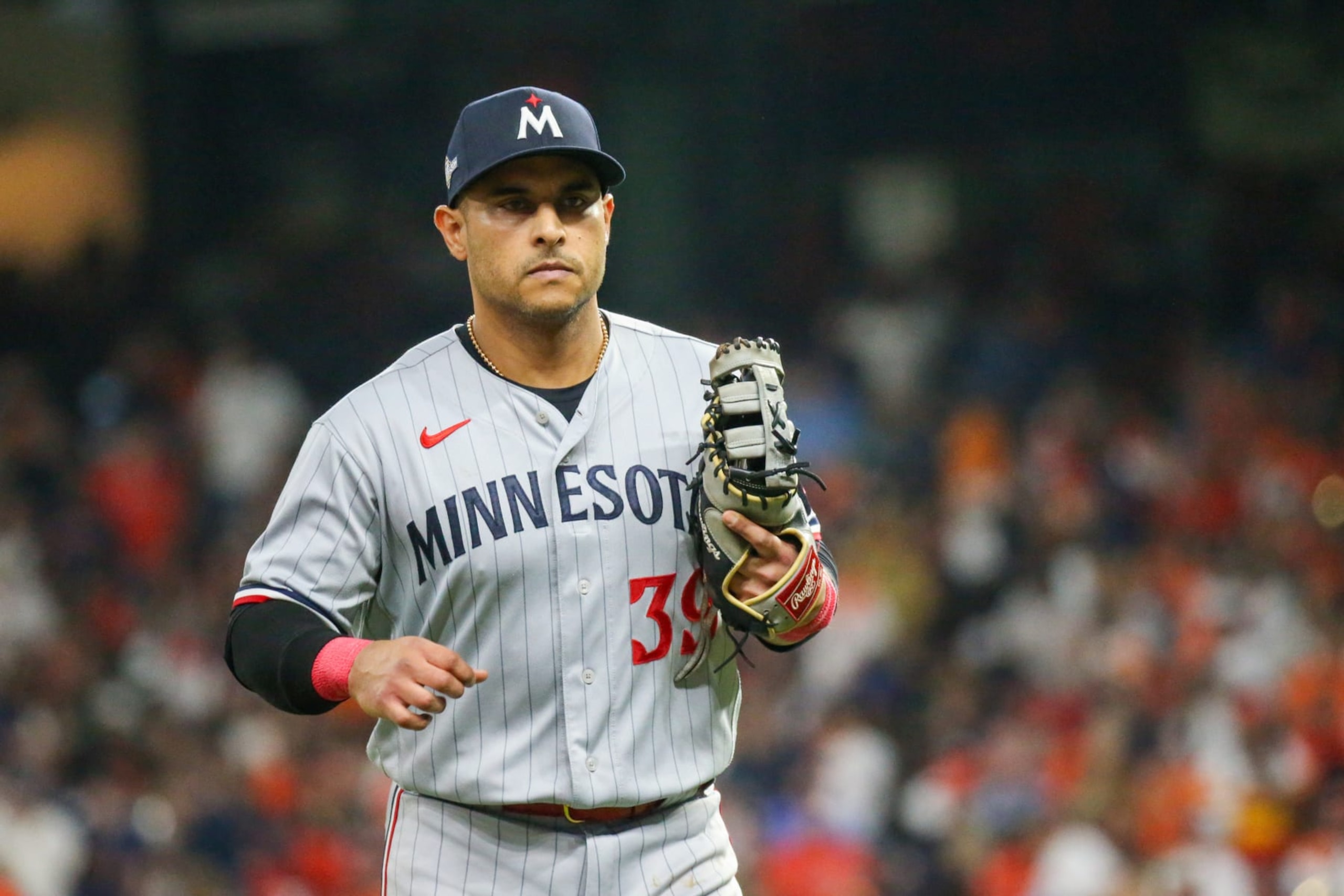 HOUSTON, TX - OCTOBER 08: Minnesota Twins first baseman Donovan Solano (39) returns to dugout following the bottom of the fourth inning during the Major League Baseball ALDS Game 2 between the Minnesota Twins and Houston Astros on October 8, 2023 at Minute Maid Park in Houston, Texas. (Photo by Leslie Plaza Johnson/Icon Sportswire via Getty Images) HOUSTON, TX - OCTOBER 08: Minnesota Twins first baseman Donovan Solano (39) returns to dugout following the bottom of the fourth inning during the Major League Baseball ALDS Game 2 between the Minnesota Twins and Houston Astros on October 8, 2023 at Minute Maid Park in Houston, Texas. (Photo by Leslie Plaza Johnson/Icon Sportswire via Getty Images)