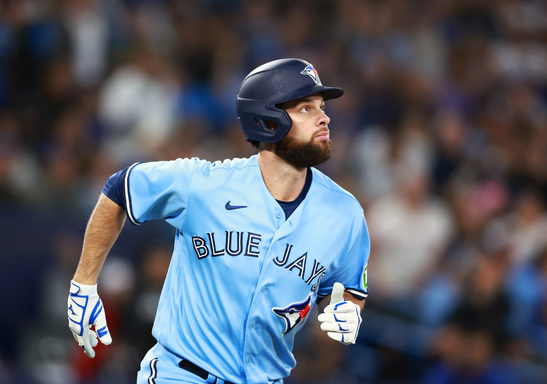 TORONTO, ON - SEPTEMBER 28: Brandon Belt #13 of the Toronto Blue Jays watches his ball clear the fence after hitting a 3-run home run in the sixth inning against the New York Yankees at Rogers Centre on September 28, 2023 in Toronto, Ontario, Canada. (Photo by Vaughn Ridley/Getty Images)