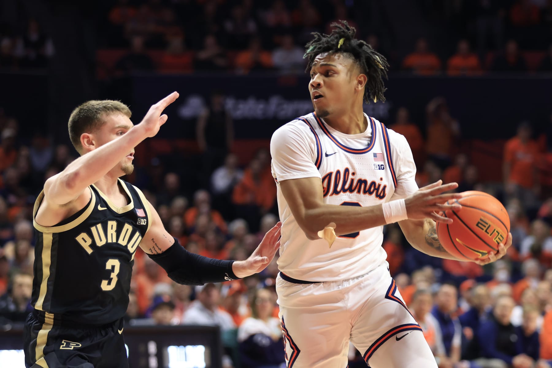 CHAMPAIGN, ILLINOIS - MARCH 05: Terrence Shannon Jr. #0 of the Illinois Fighting Illini  goes to the basket while defended by Braden Smith #3 of the Purdue Boilermakers xd1 at State Farm Center on March 05, 2024 in Champaign, Illinois. (Photo by Justin Casterline/Getty Images)