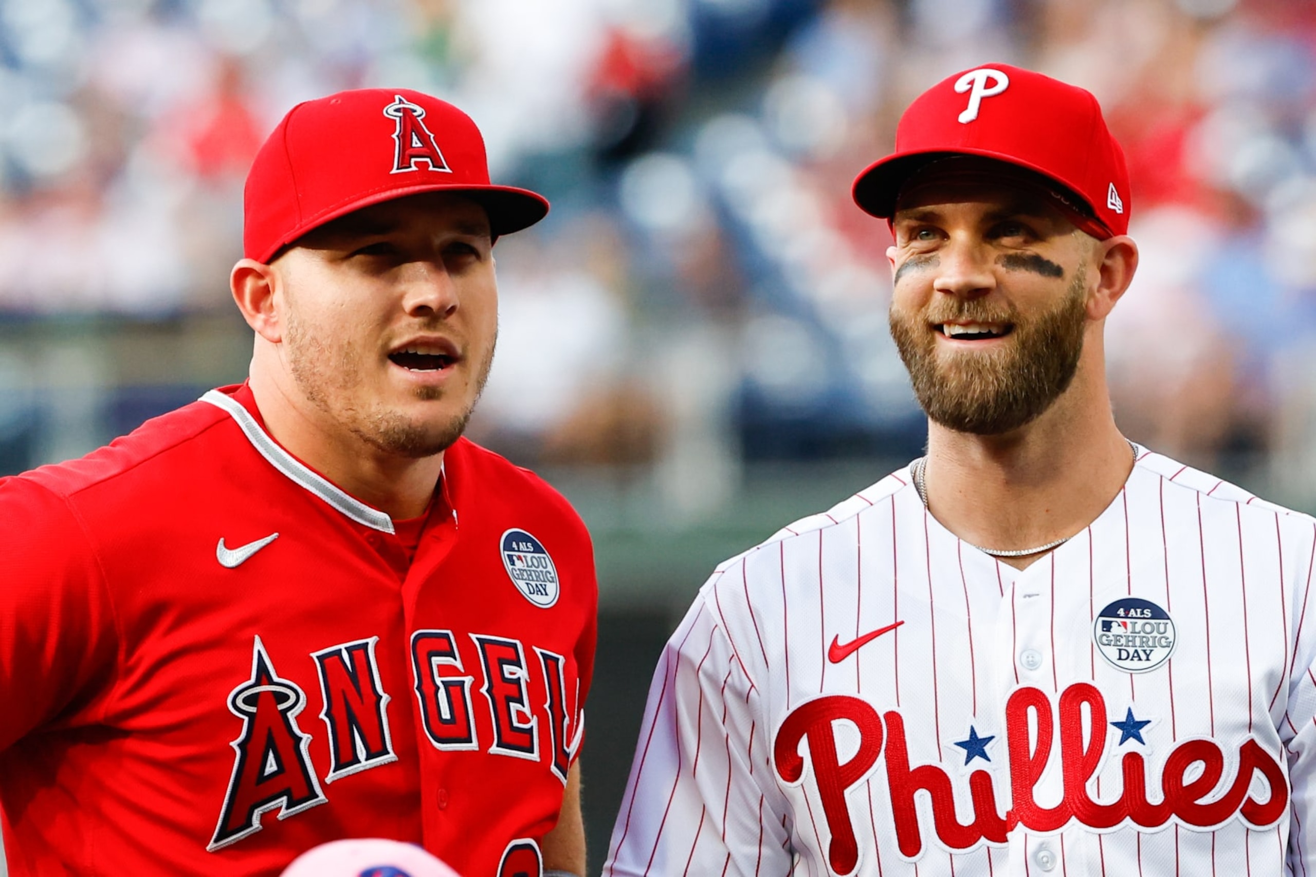 Mike Trout (L) and Bryce Harper (R) Mike Trout (L) and Bryce Harper (R)