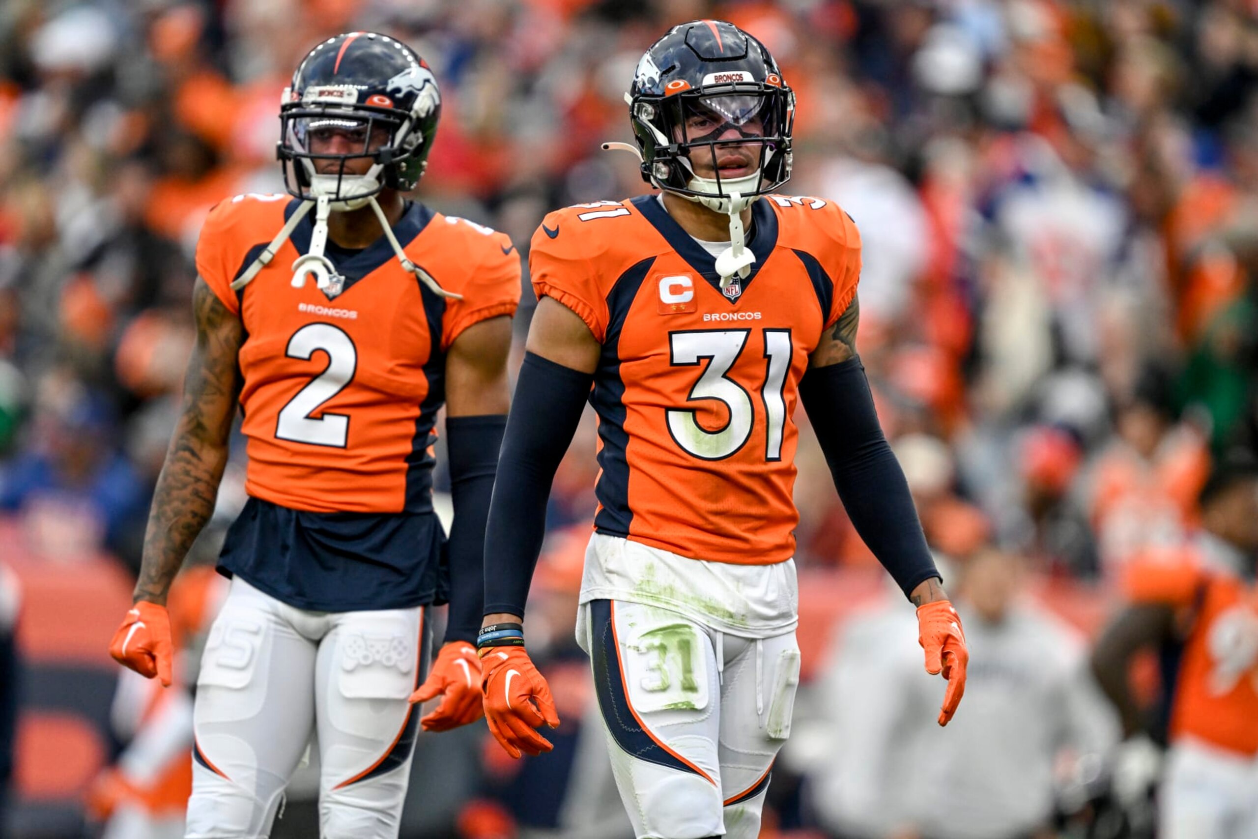 DENVER, CO - OCTOBER 23: Justin Simmons (31) and Pat Surtain II (2) of the Denver Broncos prepare for the New York Jets offense during the second half of New Yorks 16-9 win at Empower Field at Mile High in Denver on Sunday, October 23, 2022. (Photo by AAron Ontiveroz/MediaNews Group/The Denver Post via Getty Images)
