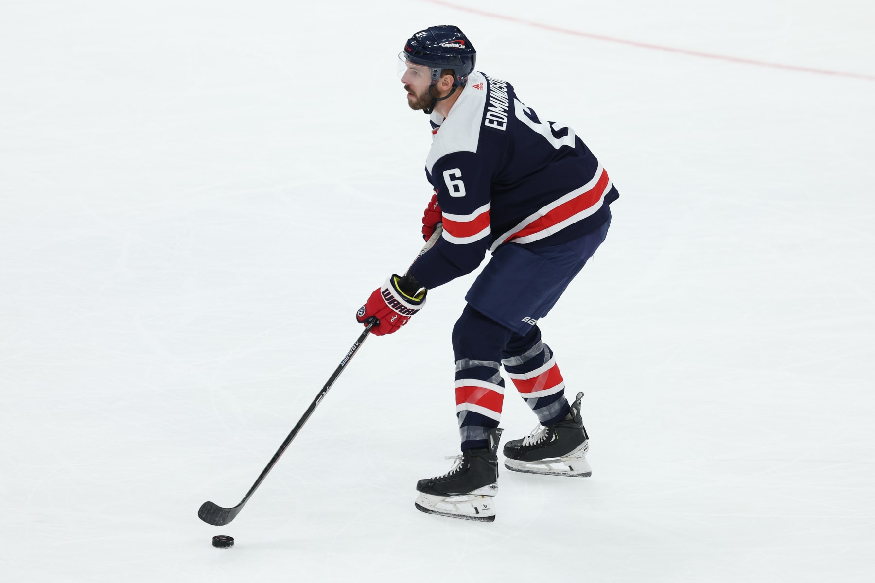 WASHINGTON, DC - FEBRUARY 20: Joel Edmundson #6 of the Washington Capitals skates against the New Jersey Devils during the first period at Capital One Arena on February 20, 2024 in Washington, DC. (Photo by Patrick Smith/Getty Images)
