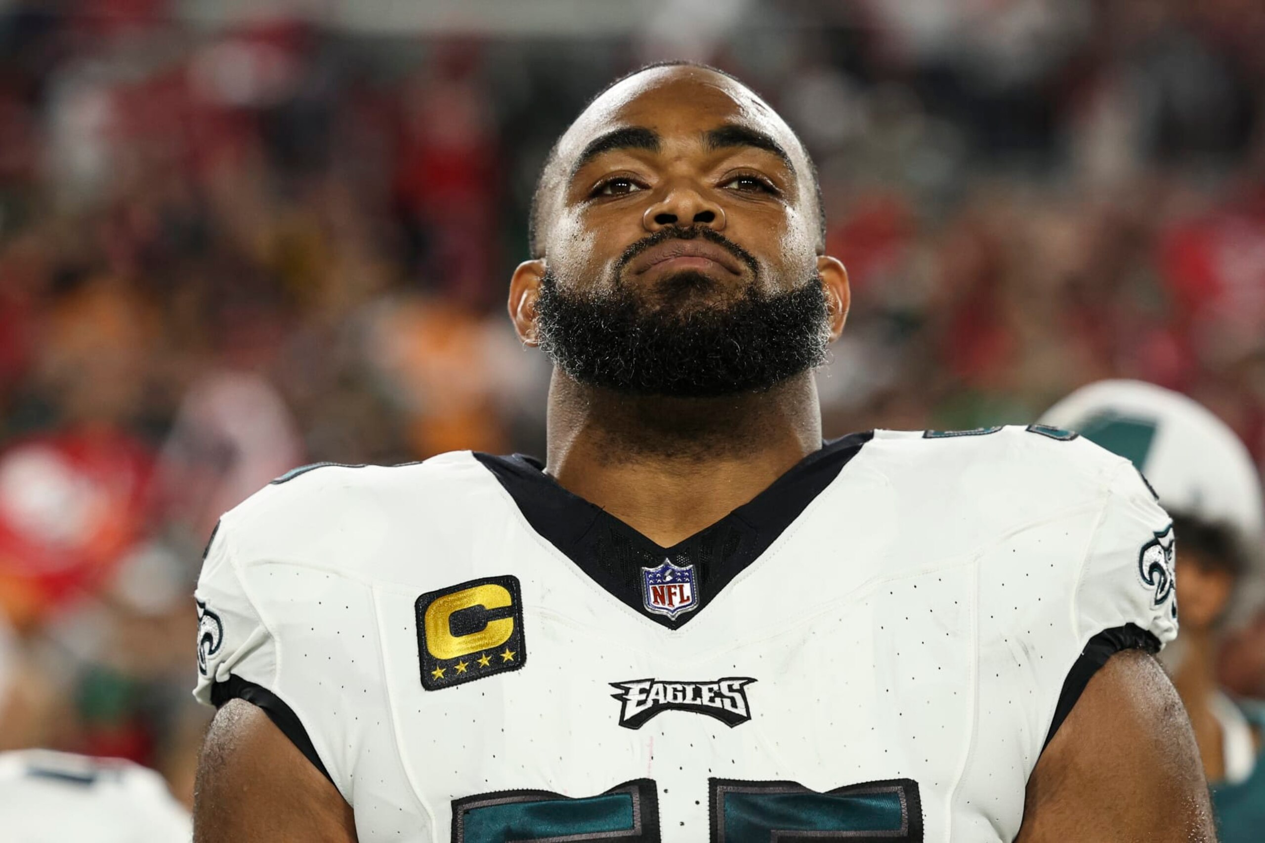 TAMPA, FL - JANUARY 15: Brandon Graham #55 of the Philadelphia Eagles looks on from the sideline during the national anthem prior to an NFL Wild Card playoff football game against the Tampa Bay Buccaneers at Raymond James Stadium on January 15, 2024 in Tampa, Florida. (Photo by Perry Knotts/Getty Images)