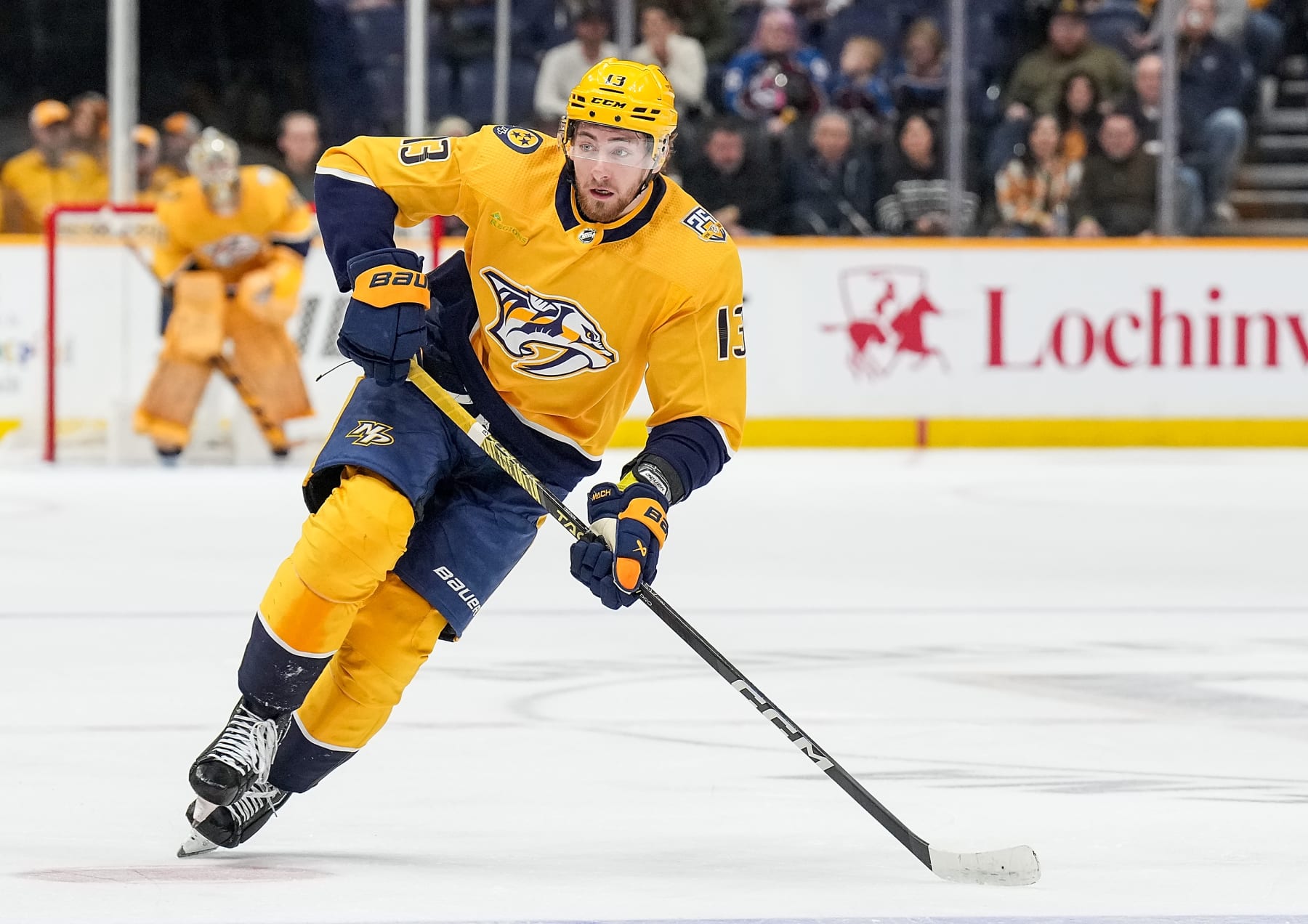 NASHVILLE, TENNESSEE - MARCH 2: Yakov Trenin #13 of the Nashville Predators skates against the Colorado Avalanche during an NHL game at Bridgestone Arena on March 2, 2024 in Nashville, Tennessee. (Photo by John Russell/NHLI via Getty Images)