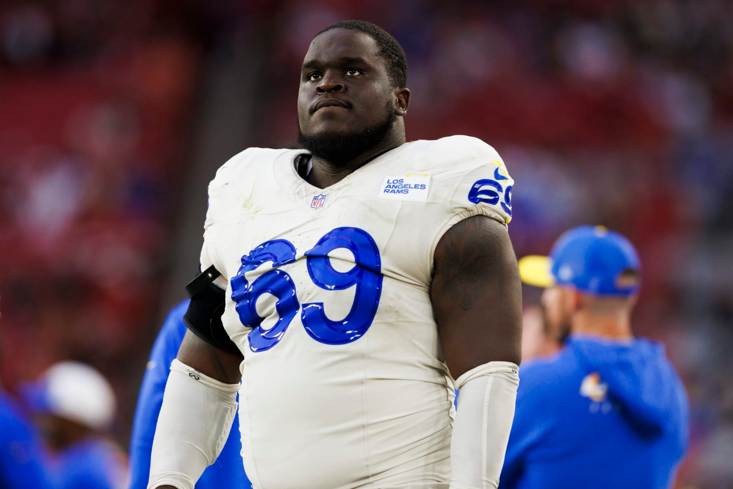 GLENDALE, ARIZONA - NOVEMBER 26: Kevin Dotson #69 of the Los Angeles Rams on the sideline during a game against the Arizona Cardinals at State Farm Stadium on November 26, 2023 in Glendale, Arizona. (Photo by Ric Tapia/Getty Images) GLENDALE, ARIZONA - NOVEMBER 26: Kevin Dotson #69 of the Los Angeles Rams on the sideline during a game against the Arizona Cardinals at State Farm Stadium on November 26, 2023 in Glendale, Arizona. (Photo by Ric Tapia/Getty Images)