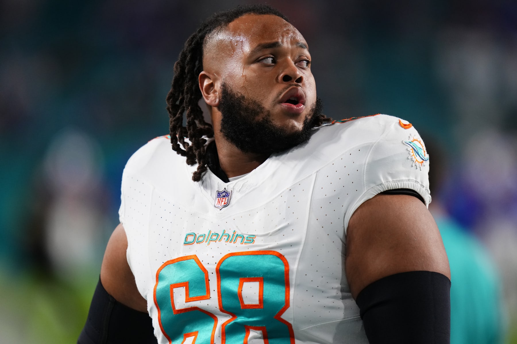 MIAMI GARDENS, FLORIDA - JANUARY 07: Robert Hunt #68 of the Miami Dolphins warms up prior to a game against the Buffalo Bills at Hard Rock Stadium on January 07, 2024 in Miami Gardens, Florida. (Photo by Rich Storry/Getty Images)