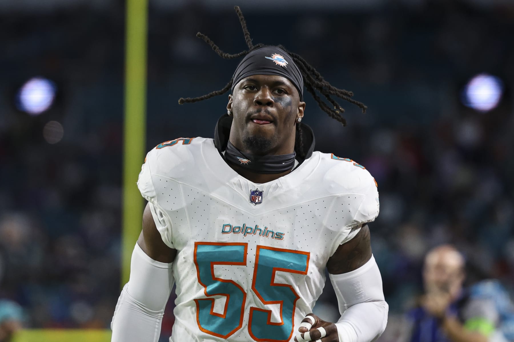 MIAMI GARDENS, FL - JANUARY 07: Jerome Baker #55 of the Miami Dolphins walks off of the field after warmups prior to an NFL football game against the Buffalo Bills at Hard Rock Stadium on January 7, 2024 in Miami Gardens, Florida. (Photo by Perry Knotts/Getty Images)