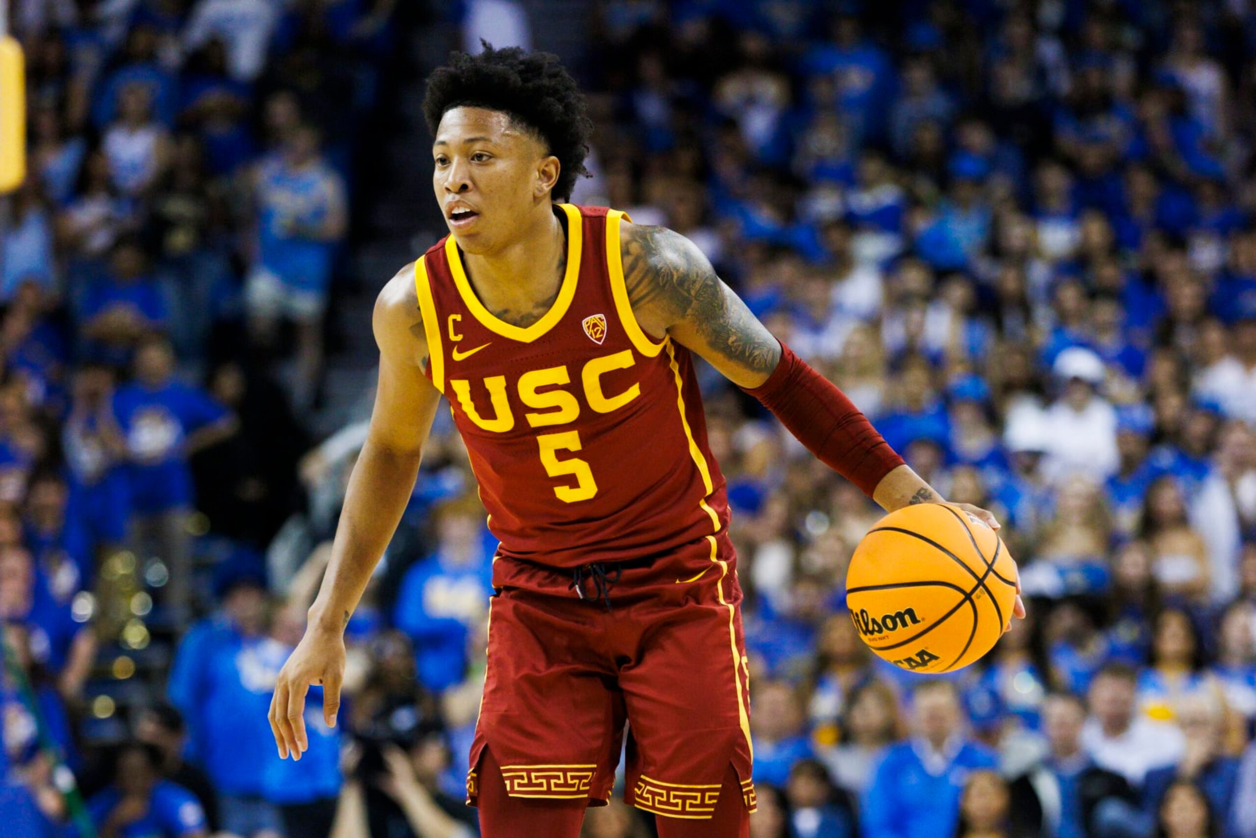 LOS ANGELES, CA - FEBRUARY 24: USC Trojans guard Boogie Ellis (5) dribbles during a college basketball game against the UCLA Bruins on February 24, 2024 at Pauley Pavilion in Los Angeles, CA. (Photo by Ric Tapia/Icon Sportswire via Getty Images)