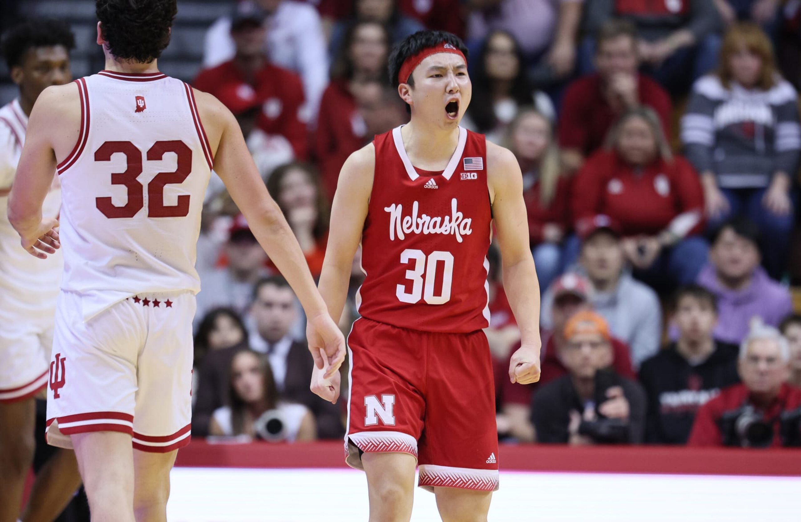 BLOOMINGTON, INDIANA - FEBRUARY 21:  Keisei Tominaga #30 of the Nebraska Cornhuskers celebrates after a basket against the Indiana Hoosiers in the second half of the game at Simon Skjodt Assembly Hall on February 21, 2024 in Bloomington, Indiana. (Photo by Andy Lyons/Getty Images)