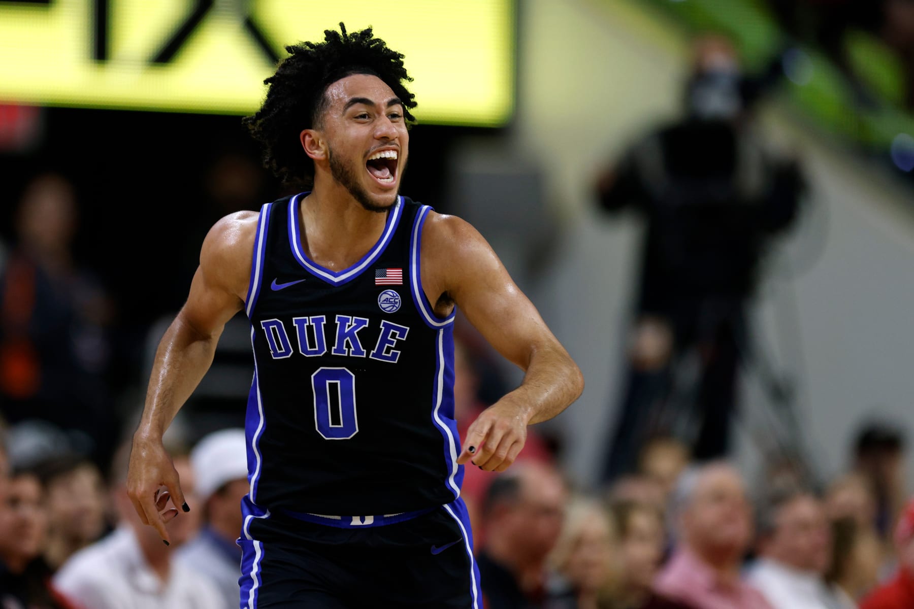 RALEIGH, NORTH CAROLINA - MARCH 4: Jared McCain #0 of the Duke Blue Devils reacts following a three-point basket during the second half of the game against the NC State Wolfpack at PNC Arena on March 4, 2024 in Raleigh, North Carolina. Duke won 79-64. (Photo by Lance King/Getty Images)