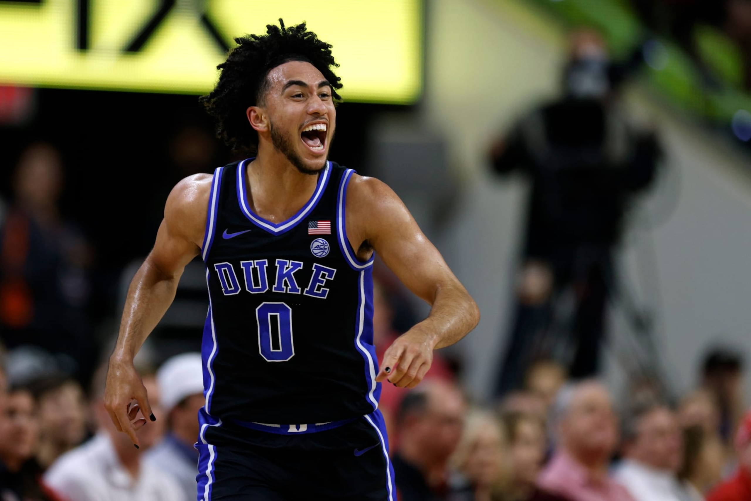 RALEIGH, NORTH CAROLINA - MARCH 4: Jared McCain #0 of the Duke Blue Devils reacts following a three-point basket during the second half of the game against the NC State Wolfpack at PNC Arena on March 4, 2024 in Raleigh, North Carolina. Duke won 79-64. (Photo by Lance King/Getty Images) RALEIGH, NORTH CAROLINA - MARCH 4: Jared McCain #0 of the Duke Blue Devils reacts following a three-point basket during the second half of the game against the NC State Wolfpack at PNC Arena on March 4, 2024 in Raleigh, North Carolina. Duke won 79-64. (Photo by Lance King/Getty Images)