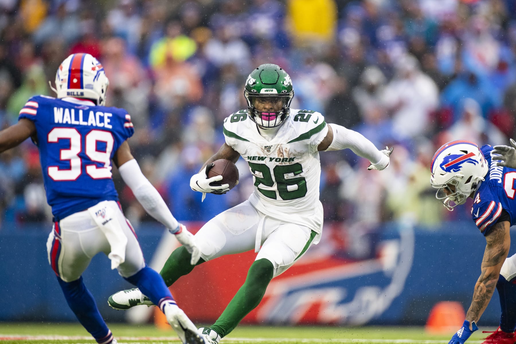ORCHARD PARK, NY - DECEMBER 29:  Le'Veon Bell #26 of the New York Jets runs with the ball during the first quarter against the Buffalo Bills at New Era Field on December 29, 2019 in Orchard Park, New York. New York defeats Buffalo 13-6.  (Photo by Brett Carlsen/Getty Images)