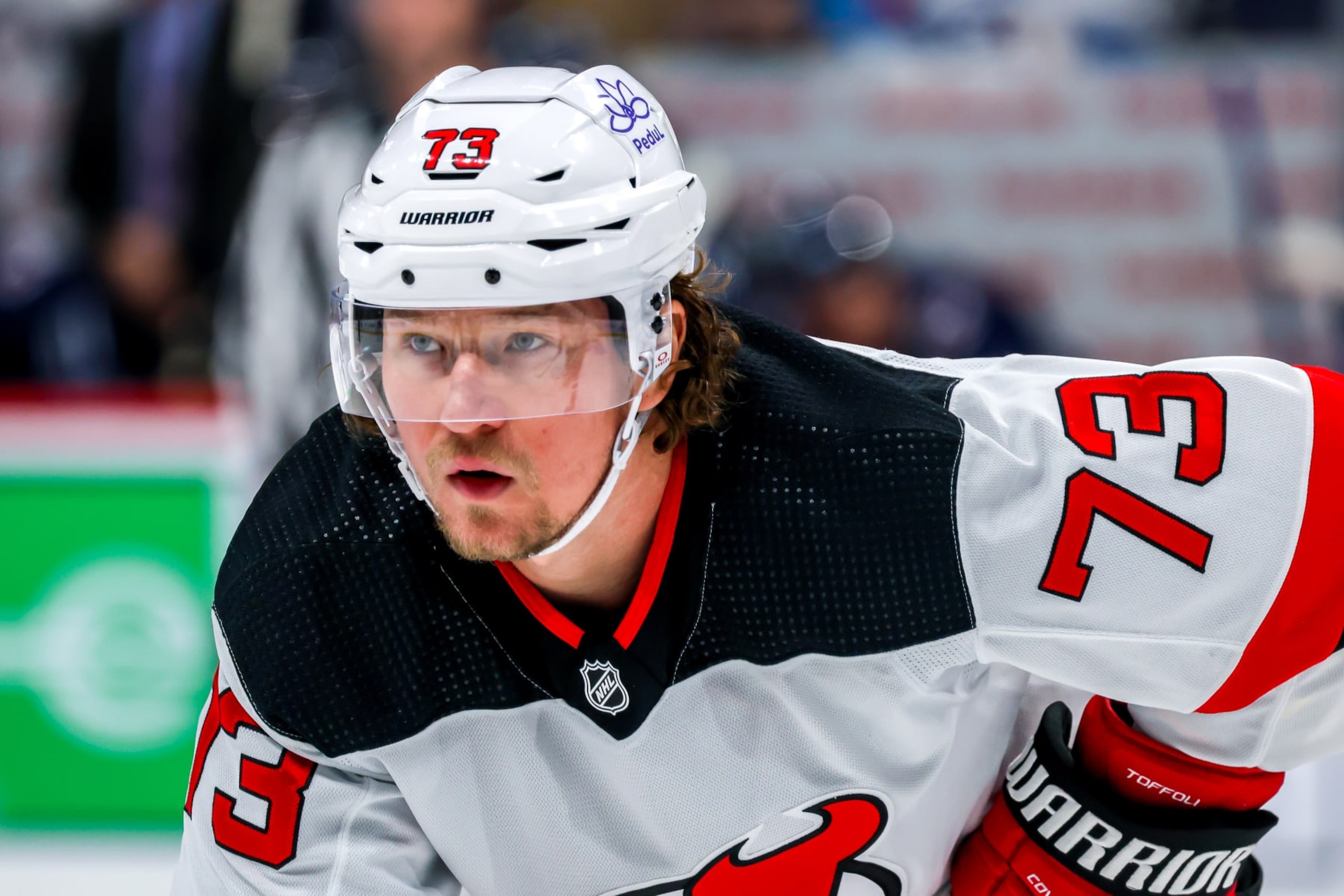 WINNIPEG, CANADA - NOVEMBER 14: Tyler Toffoli #73 of the New Jersey Devils prepares for a first period face-off against the Winnipeg Jets at Canada Life Centre on November 14, 2023 in Winnipeg, Manitoba, Canada. (Photo by Jonathan Kozub/NHLI via Getty Images)