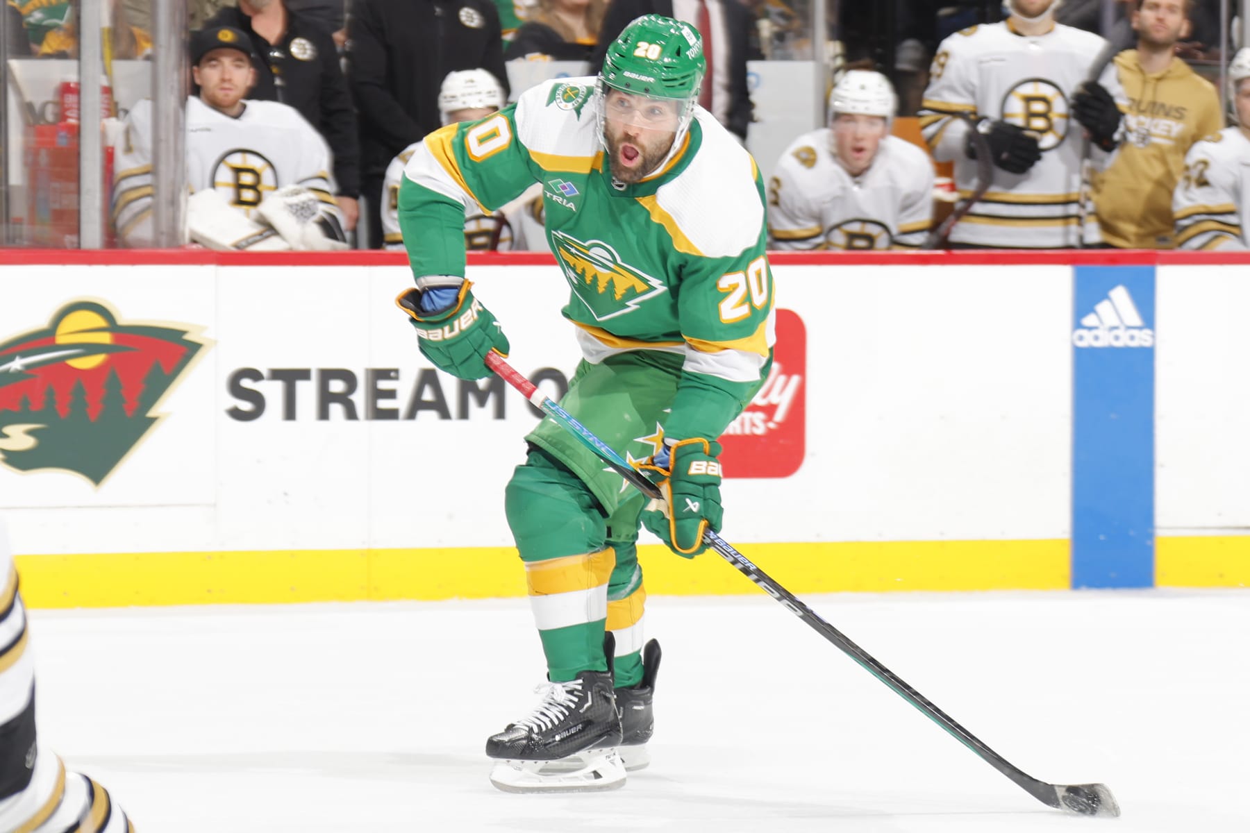 SAINT PAUL, MN - DECEMBER 23: Pat Maroon #20 of the Minnesota Wild passes the puck against the Boston Bruins during the game at the Xcel Energy Center on December 23, 2023 in Saint Paul, Minnesota. (Photo by Bruce Kluckhohn/NHLI via Getty Images)